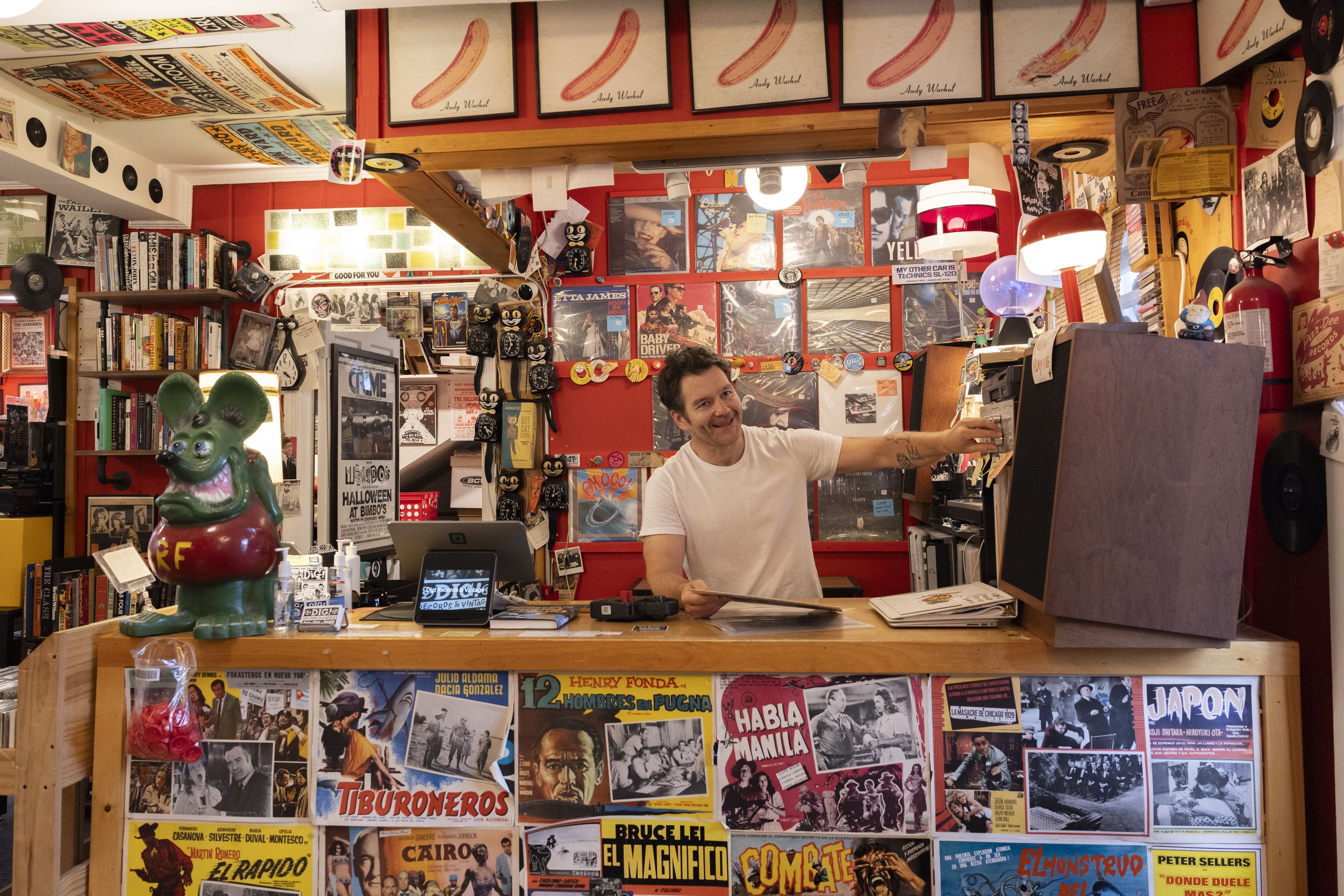 LEESBURG, Va. — Johnny, a Dig employee, listens to a record at the shop in downtown Leesburg on Sunday, Sept. 20, 2026. (Liz Helgesen)