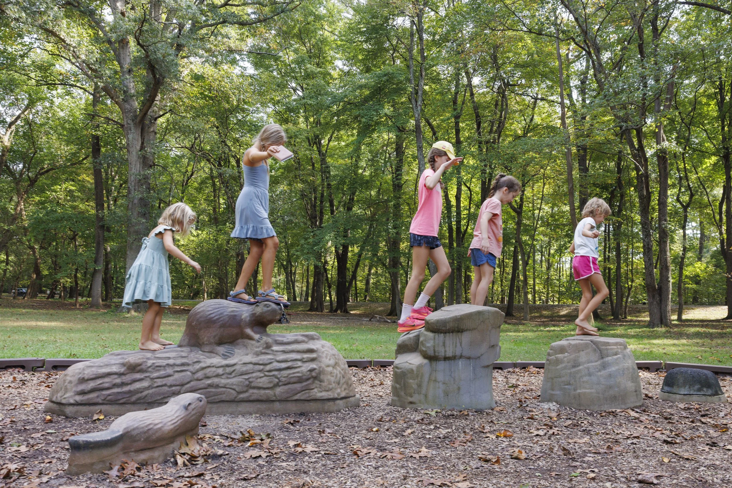 STERLING, Va. — Members of the Wild & Free homeschool group gather at Algonkian Regional Park for a three-mile hike followed by playground time. (Liz Helgesen)