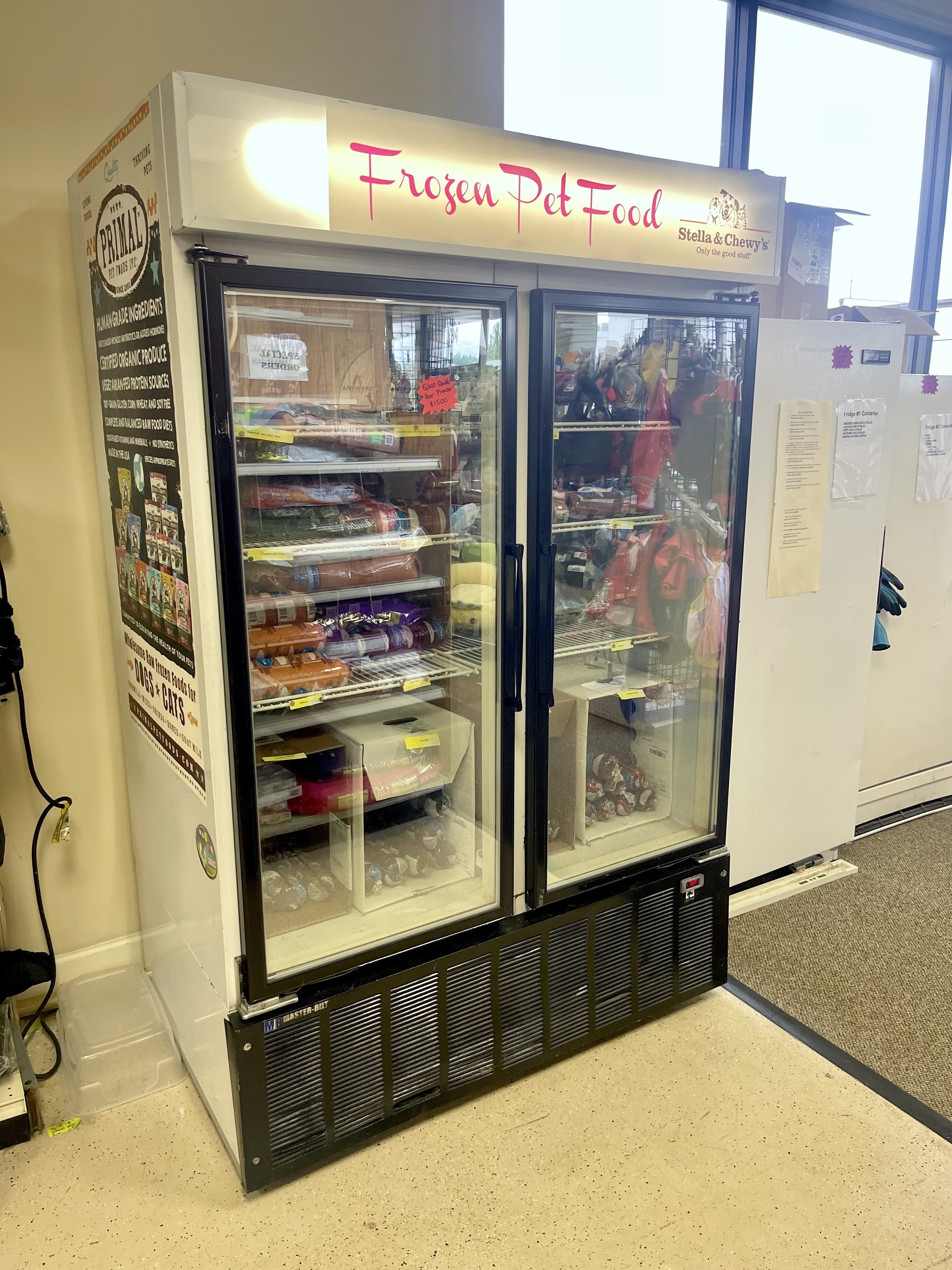 Lot 44
Glass double door pet food freezer, $1500