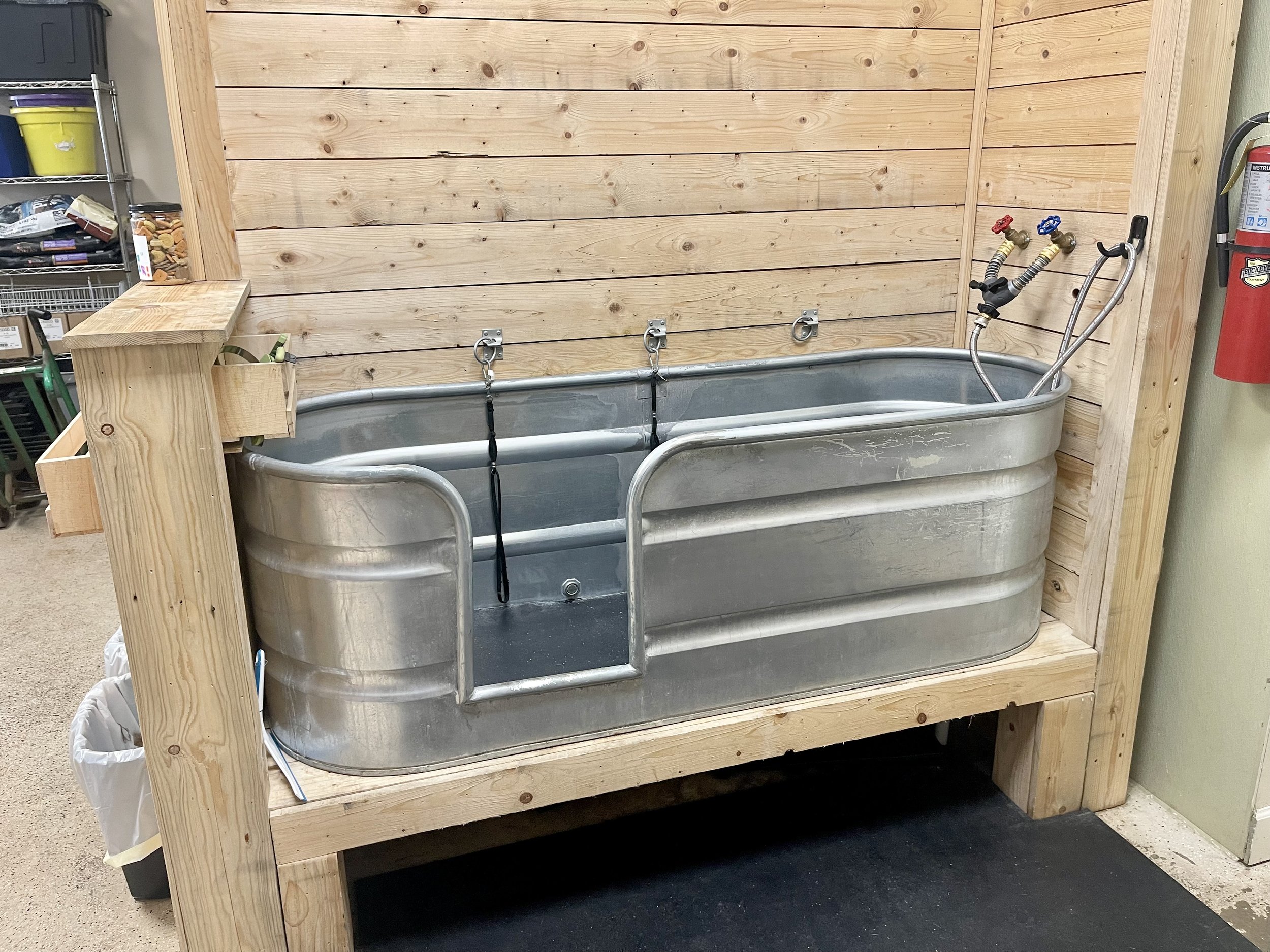 (Lot #1)
Custom built 2 bath heavy duty freestanding dog wash station with grooming tools and rubber floor mats, $1500