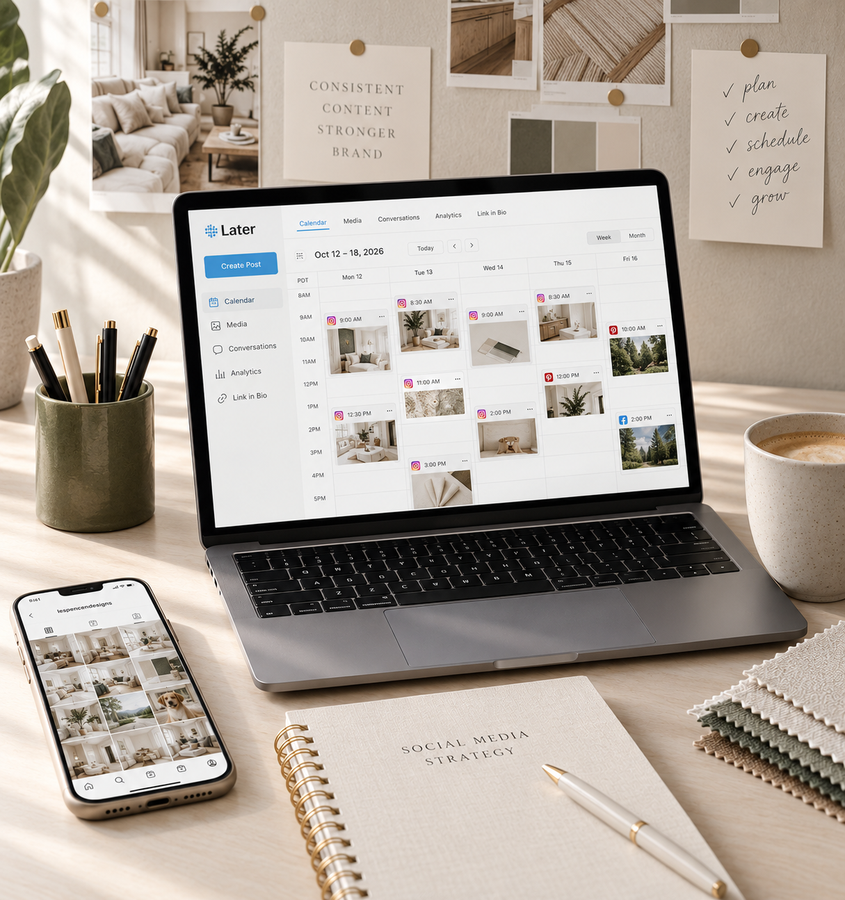 Image of a desk with an iMac and iphone showing a content calendar for social media. Neutral office space with candle, ceramic mug, greenery and natural textures.