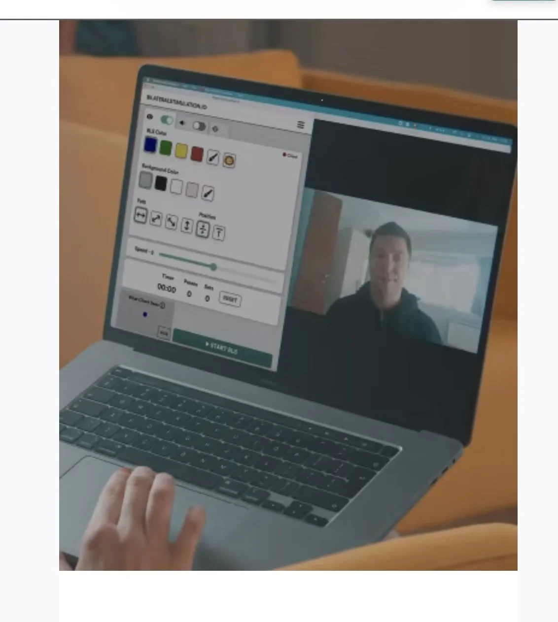 Laptop screen displaying a video chat with a man and a digital whiteboard or drawing application.