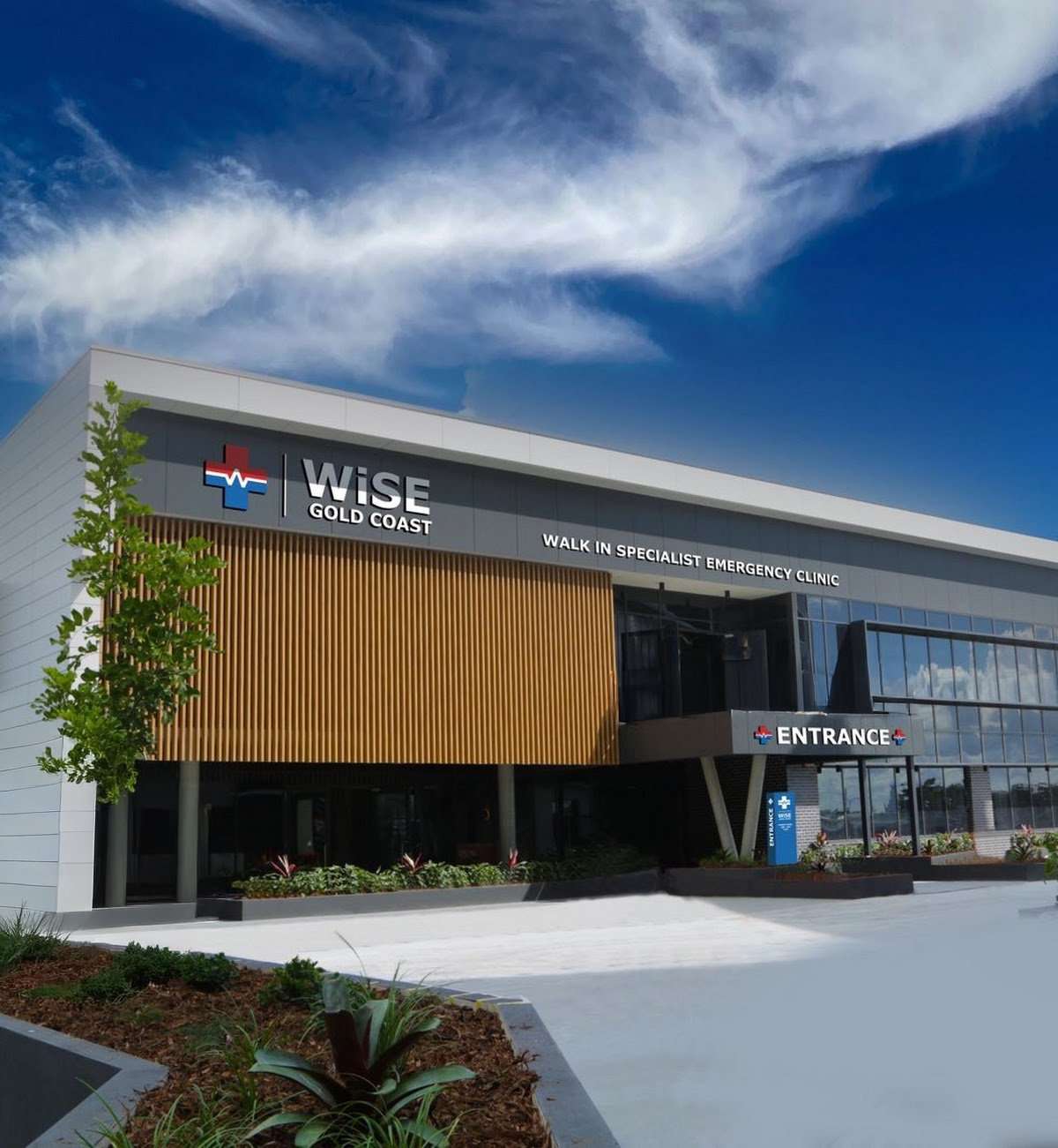 Front view of Wise Gold Coast emergency clinic with signage, entrance, and landscaping.