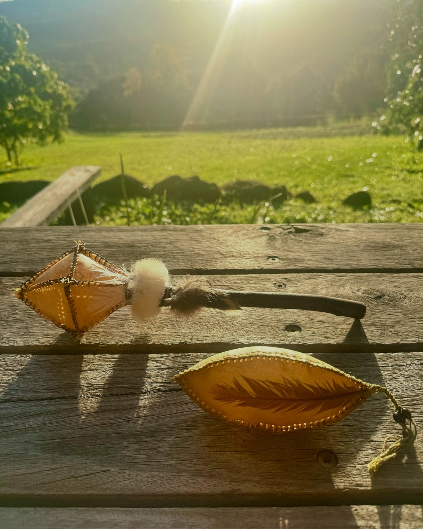 New sacred medicine rattles - Camel and Cobra.

Meet Camel (4 sided handle rattle).
Deer hide, rabbit fur, brush turkey and heron feathers, black obsidian in handle.
Tiger eye, amethyst and clear quartz for sound.
Camel&rsquo;s medicine is in bringin
