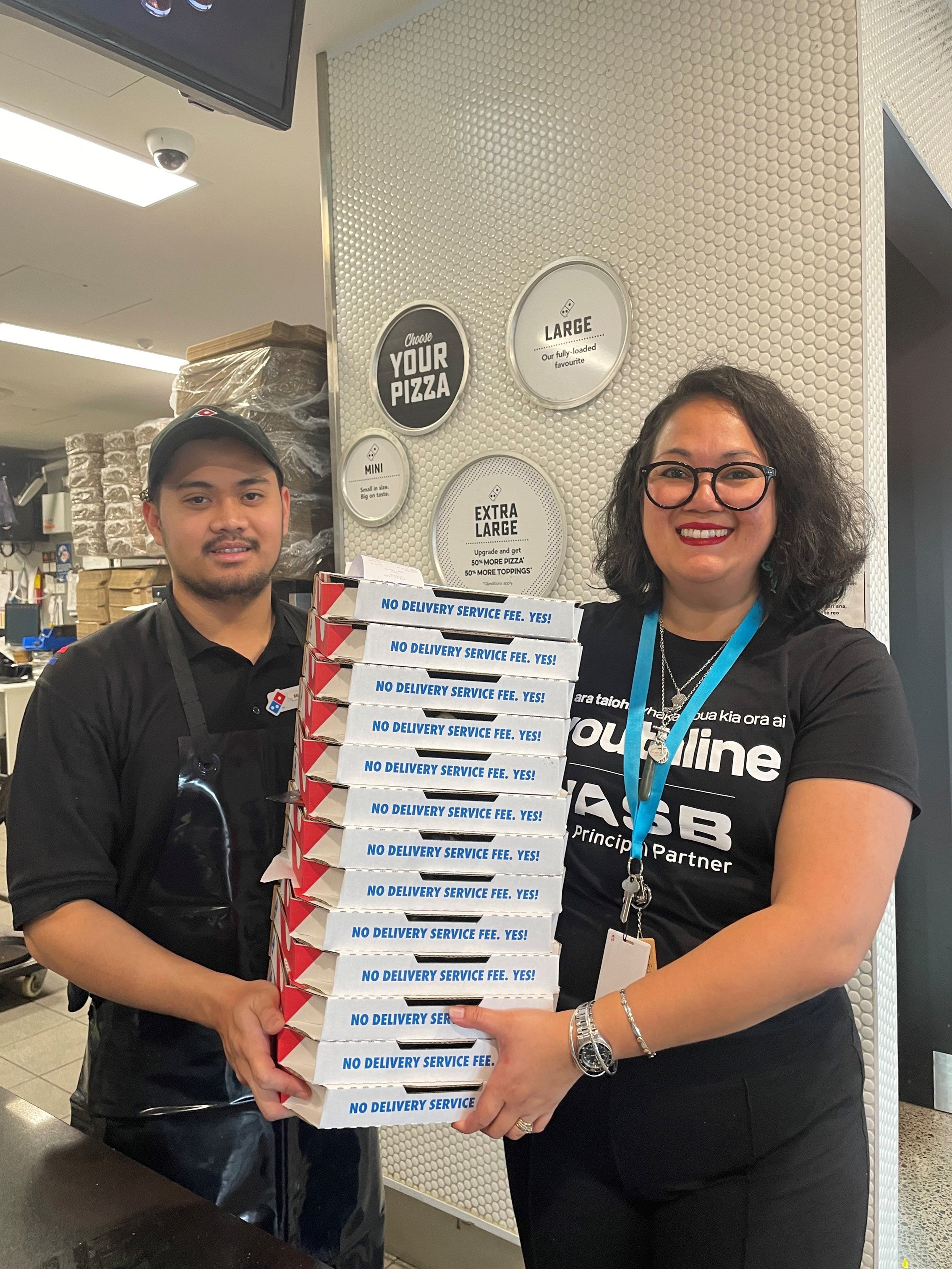 TE in Mt Eden Store with Domino's Staff.jpg