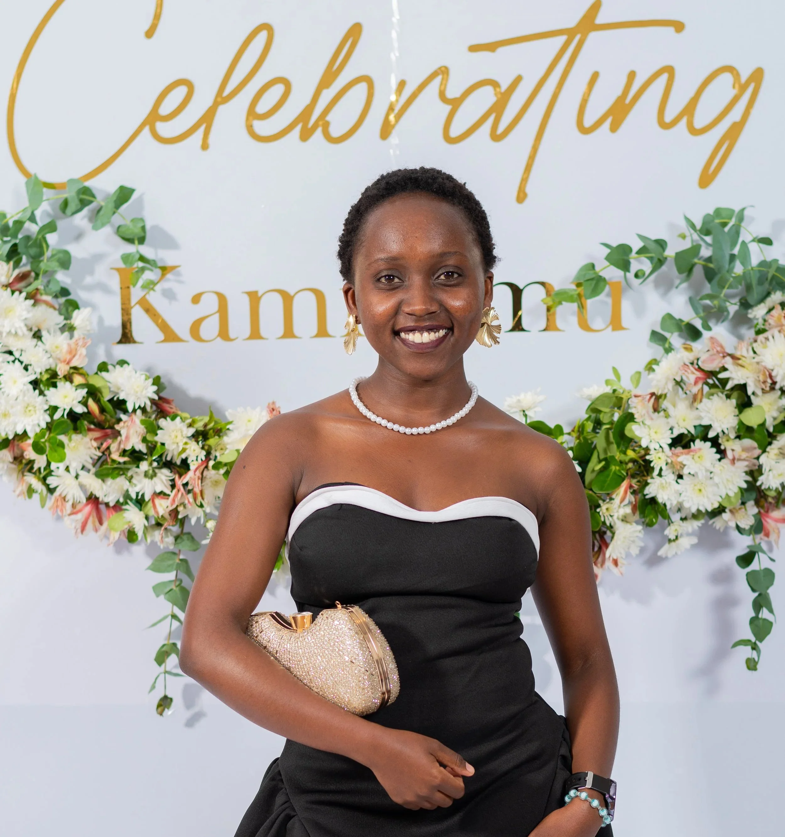 Kamilimu alumni fellow black dress