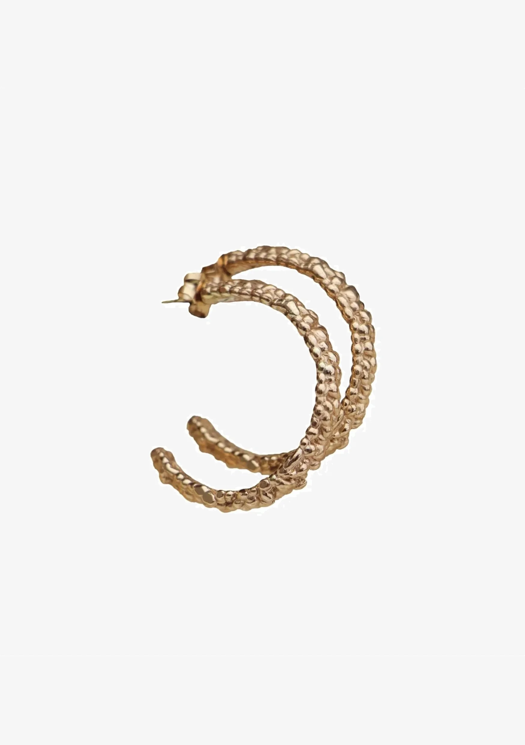 Gold hoop earrings with textured design.