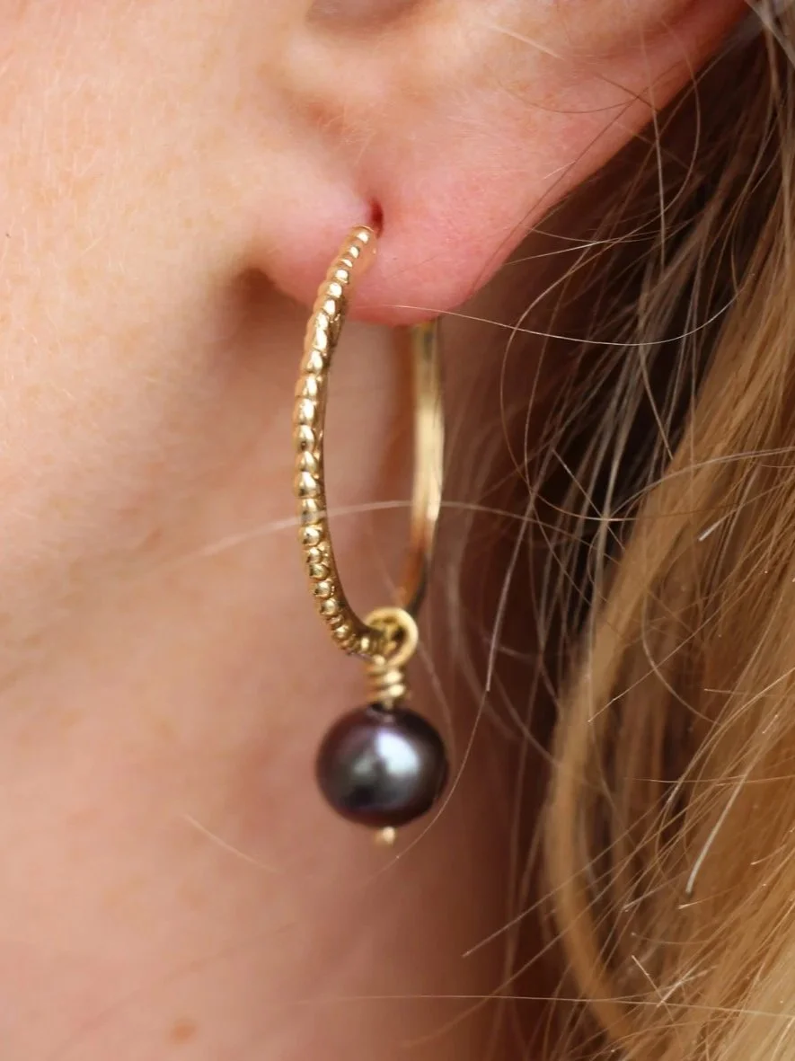 purple+pearls+in+ears+.jpg