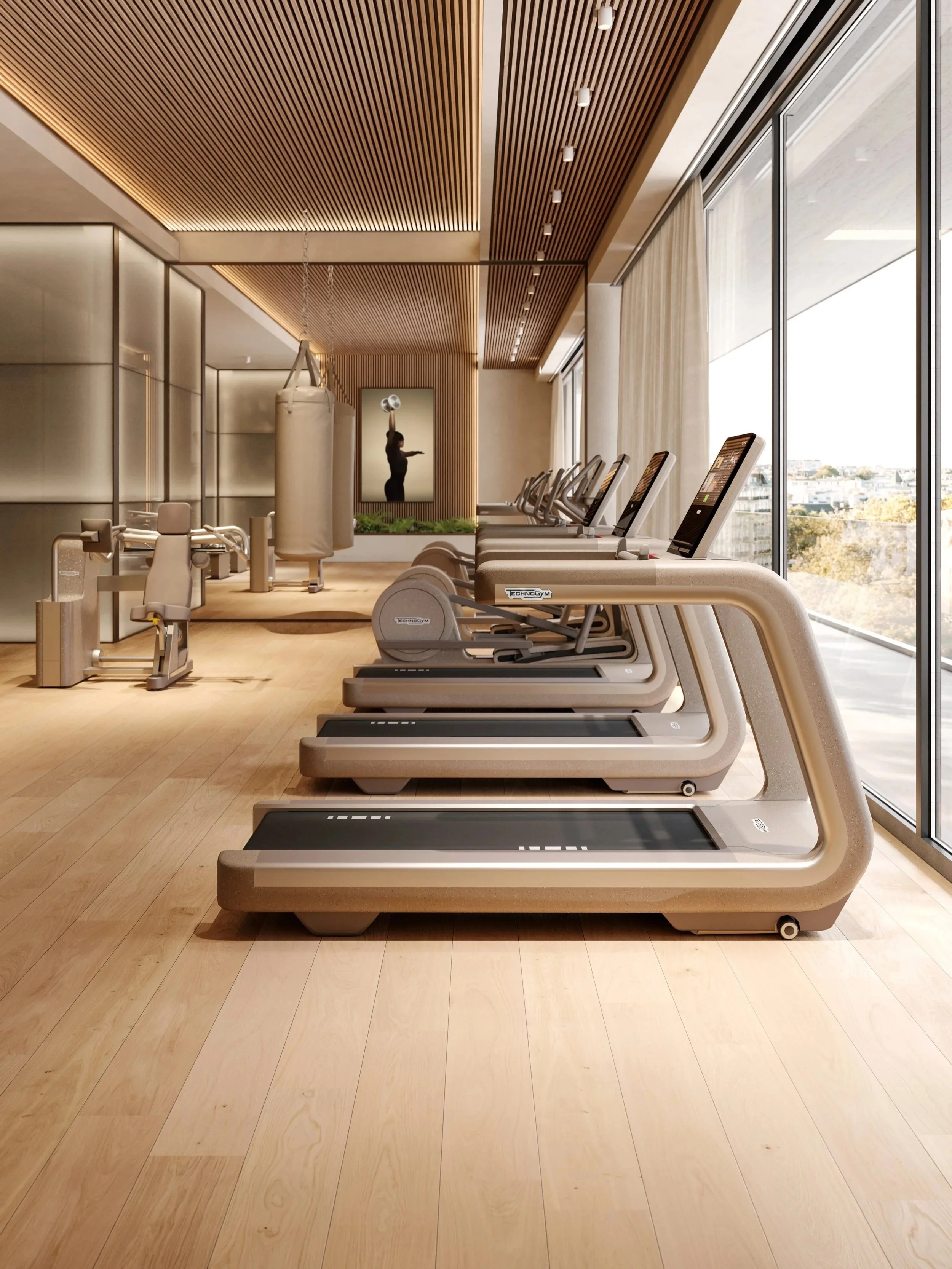 Ein modernes Fitnessstudio mit Laufbändern, Cardio-Maschinen und einem Boxsack, große Fenster mit Blick auf die Stadt, Holzdecke und Boden.