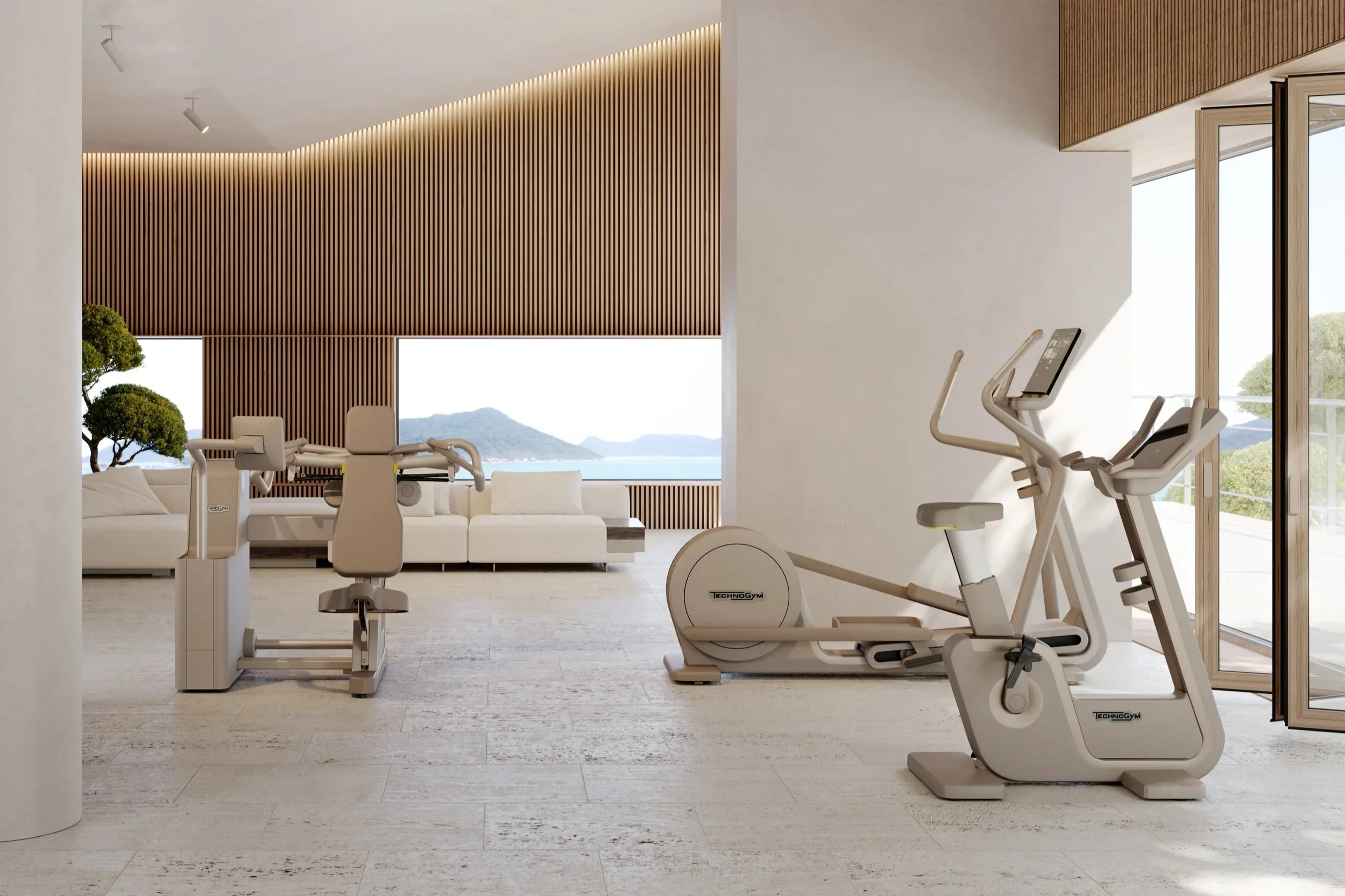 Ein moderater Fitnessraum mit Trainingsgeräten, große Fenster mit Blick auf eine Landschaft mit Wasser und Bergen, Holzverkleidungen an der Decke und Wand