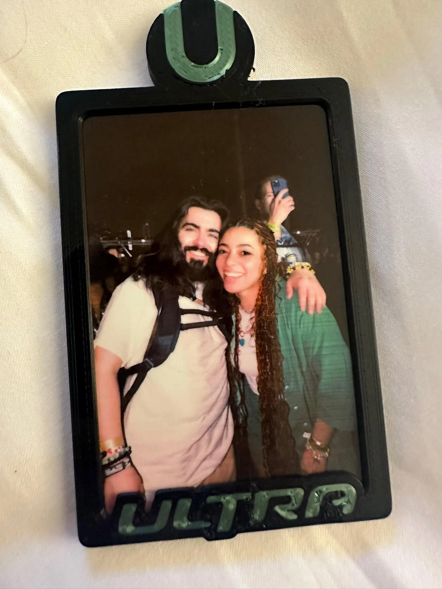 A picture of an Ultra Music Festival branded photo of Mykroh and Avril.