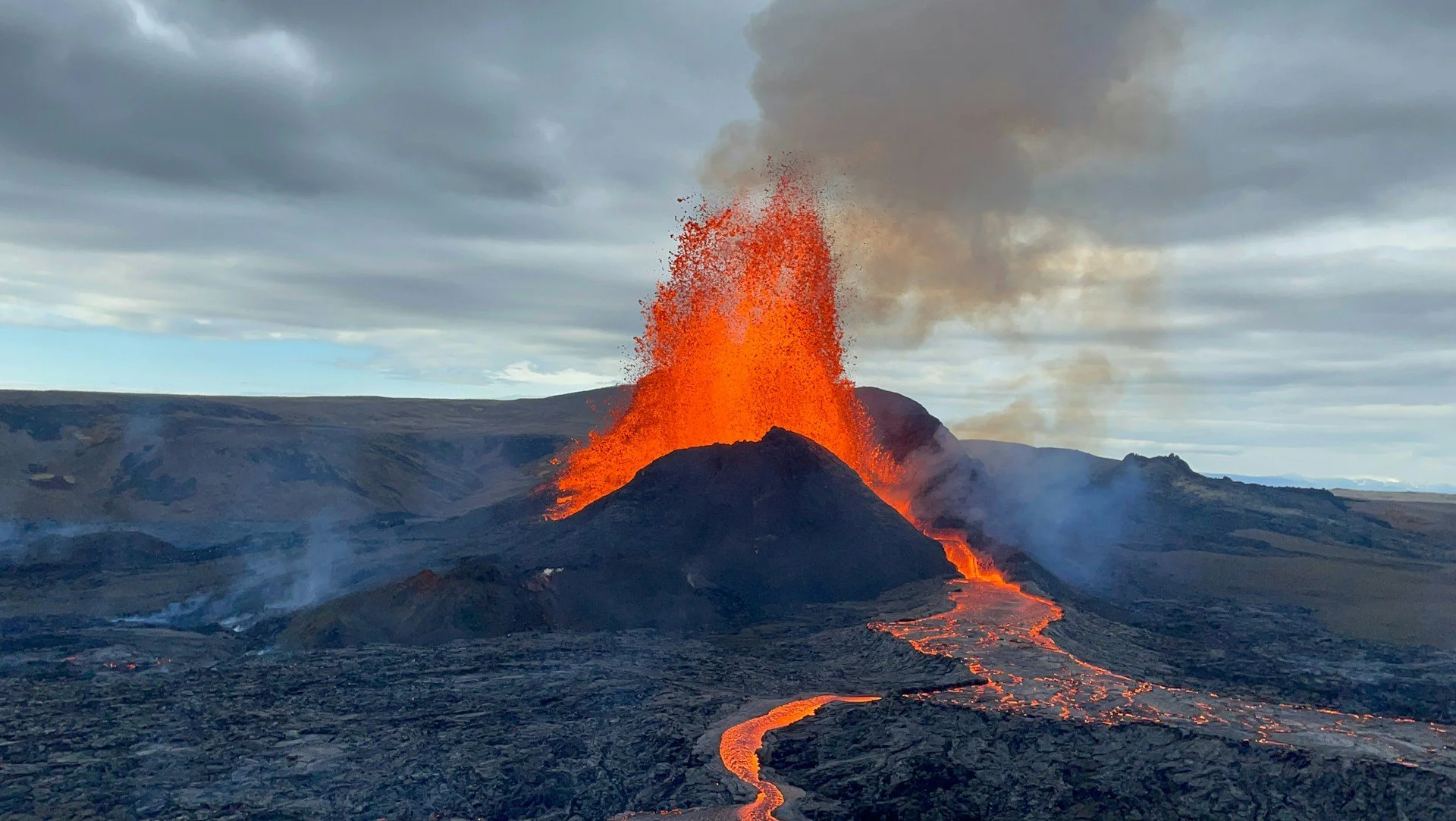A dramatic volcano erupting against a dark sky—symbolizing repressed emotion, explosive anger, and the raw power of nature.