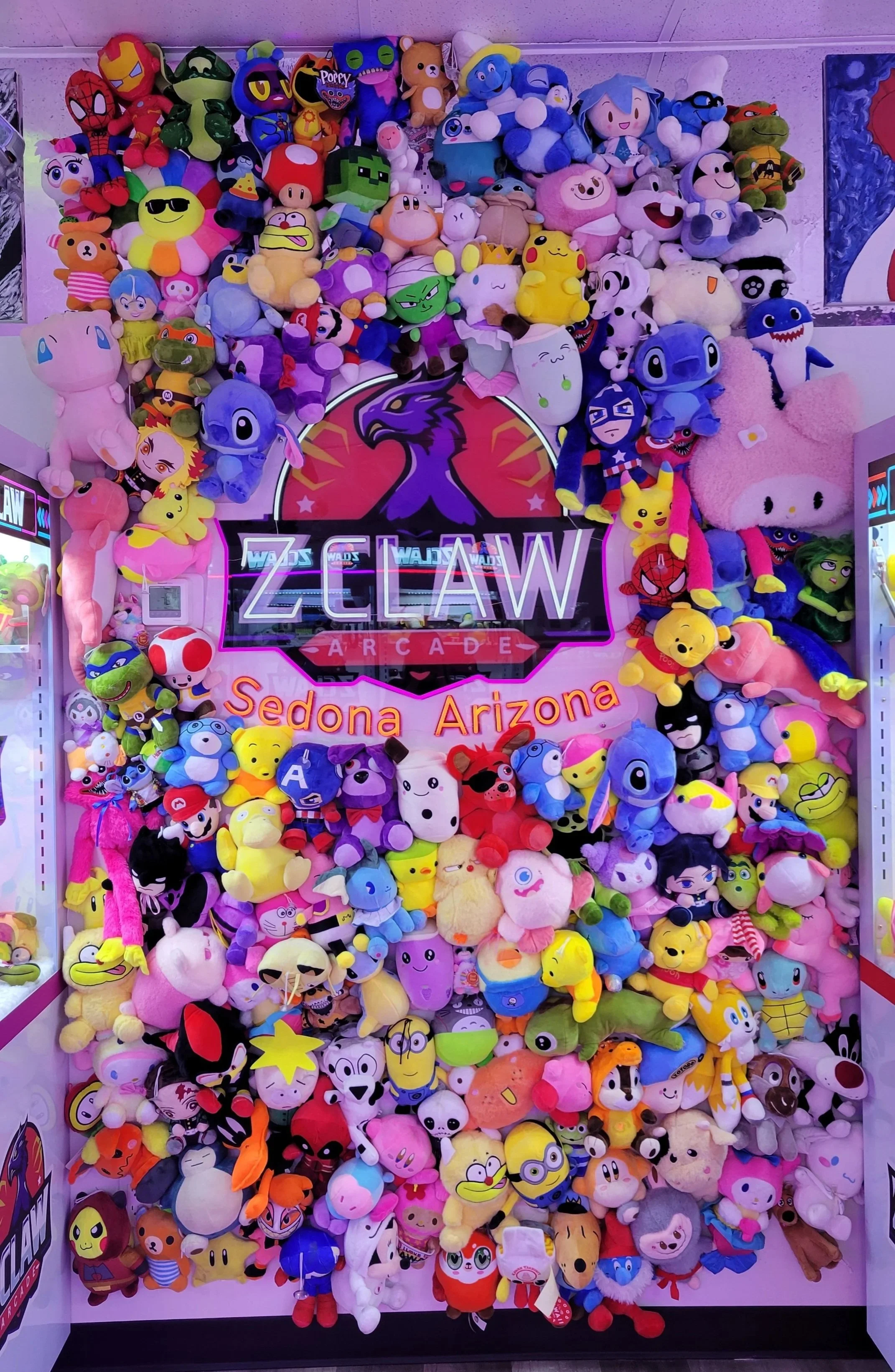 Zclaw Arcade | 5 star arcade | photo op plushy wall