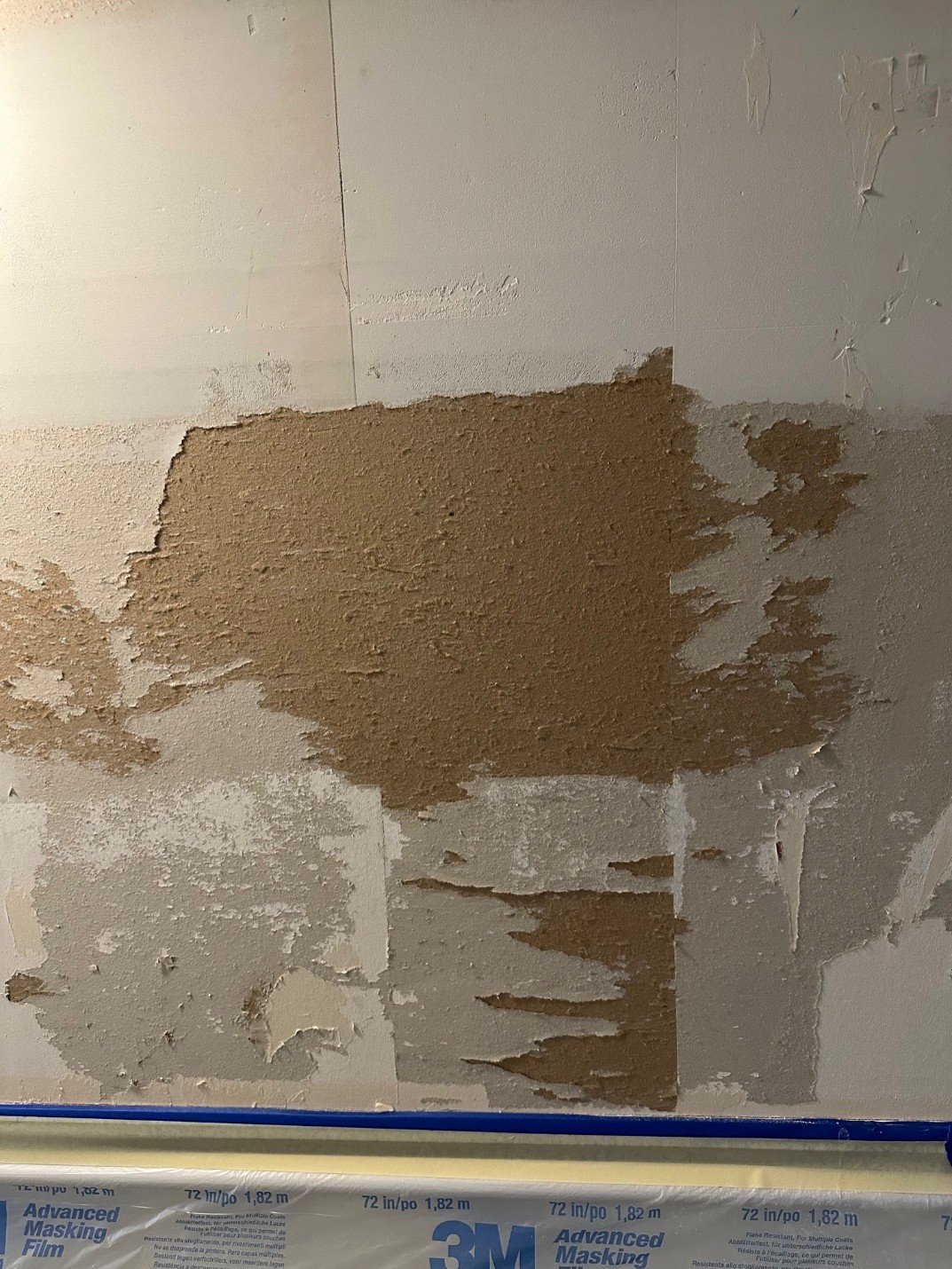 Wallpaper Blues? How to Repair Torn Drywall Before Re-Hanging That Bold Mural