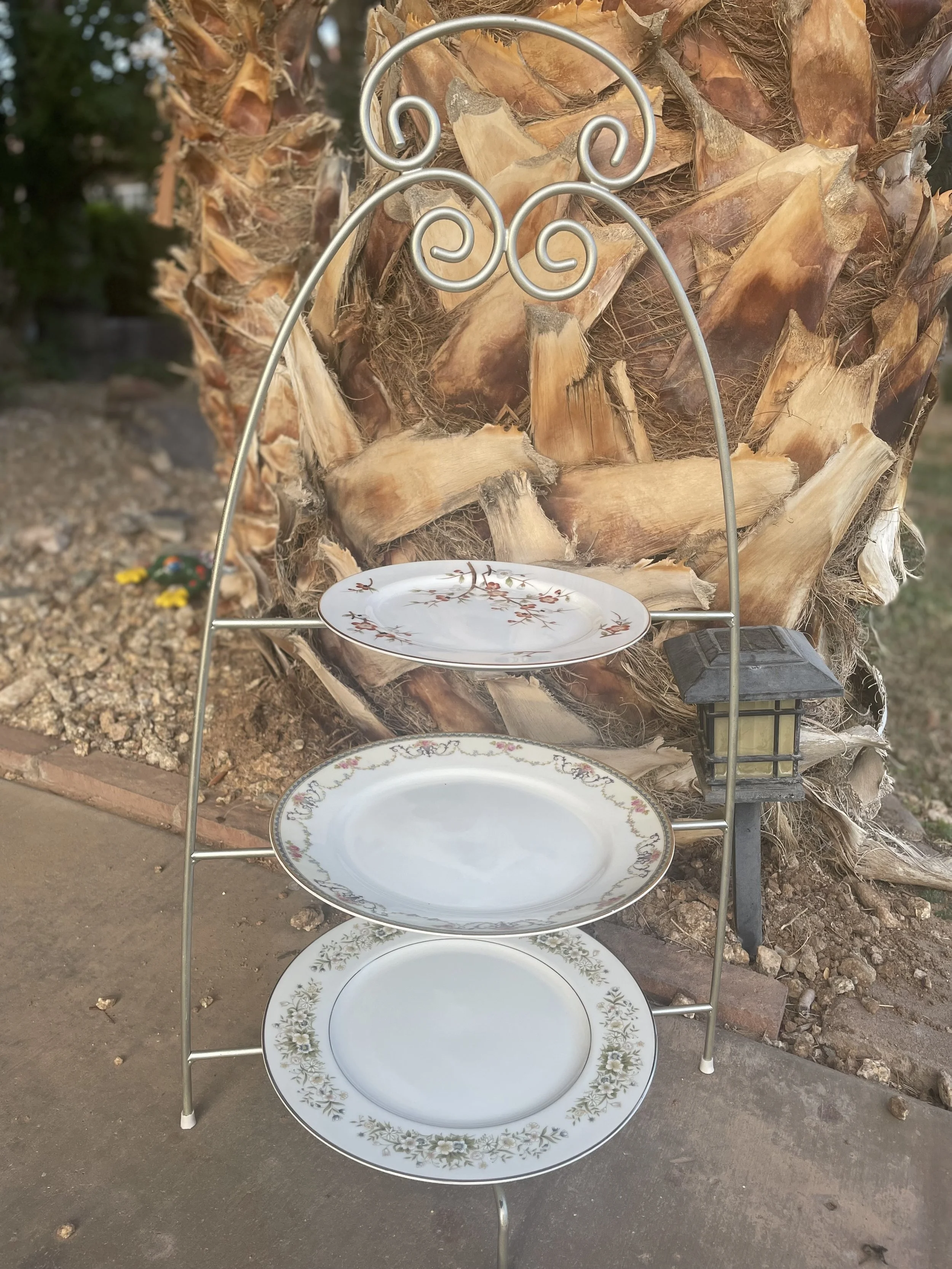 3 tiered stand
Includes two mismatched fine china dinner plates and one dessert sized plate