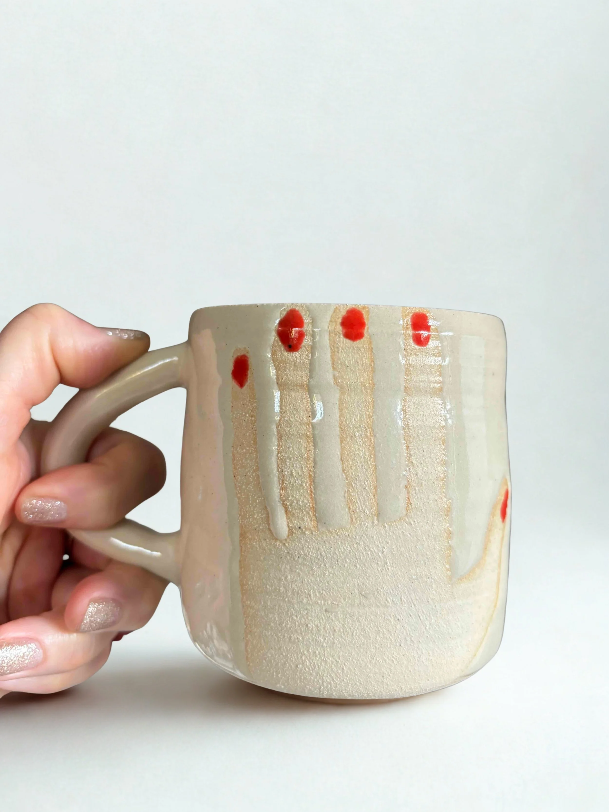 hands mug white background.jpg