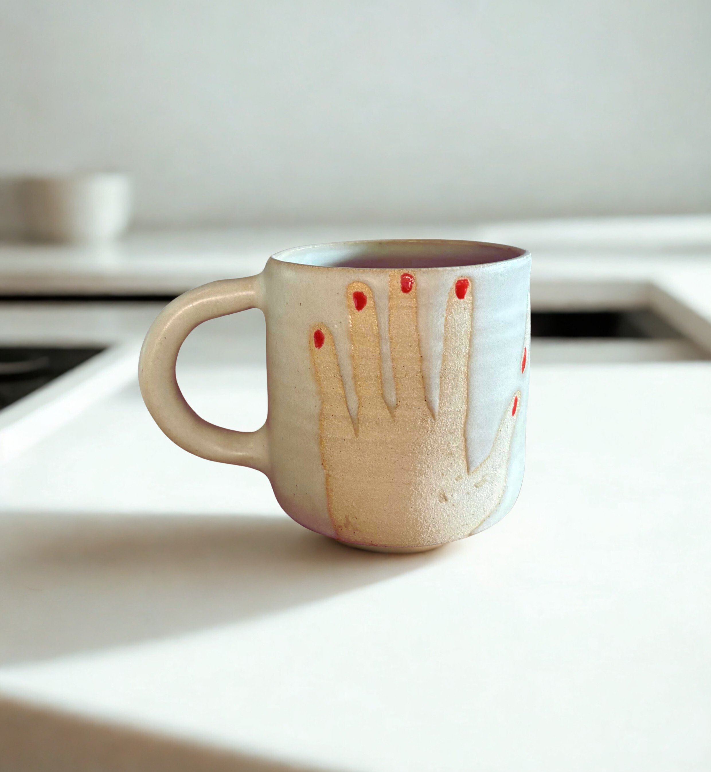 hands mug minimal kitchen.jpg