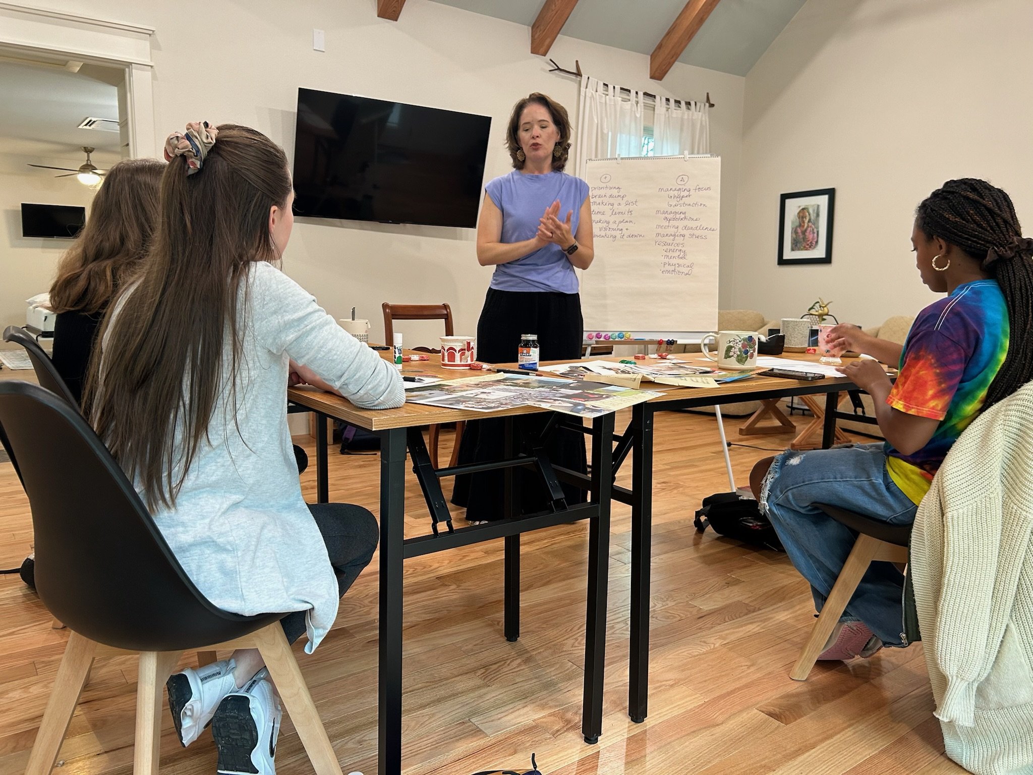 a person teaching a group