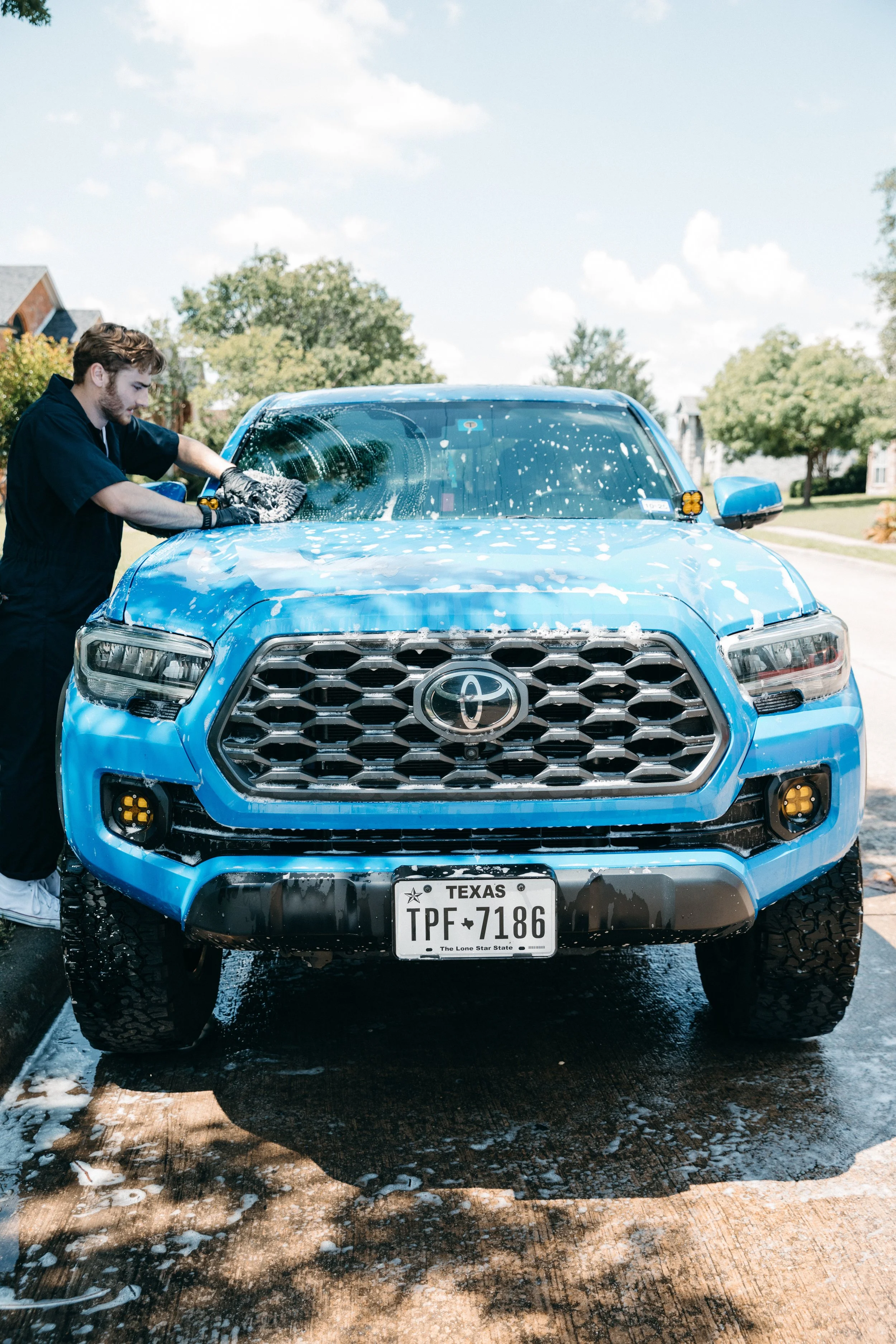 Exterior paint decontamination on luxury vehicle Highland Park TX