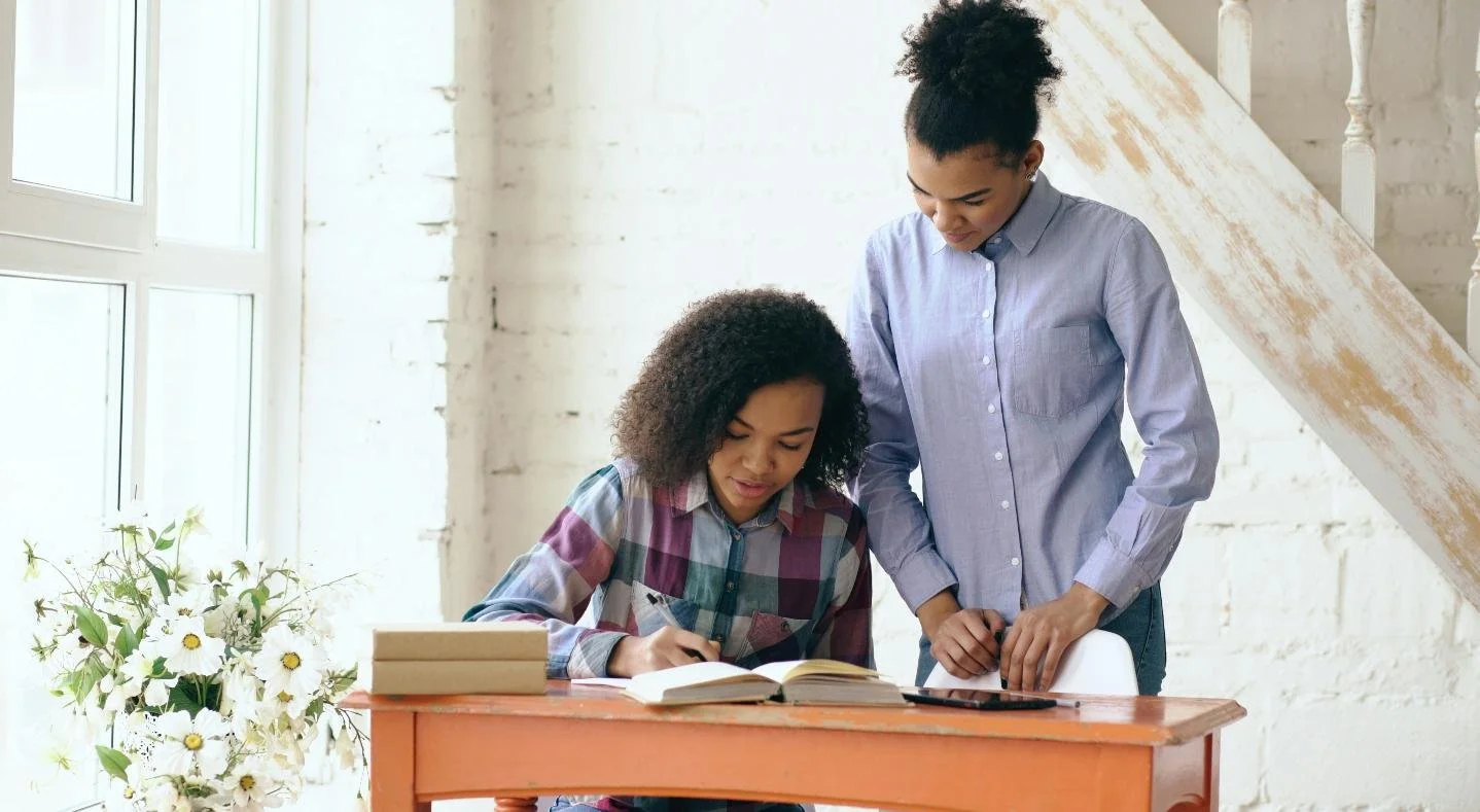 Math tutor helping a student with one-on-one tutoring in Mooresville, NC