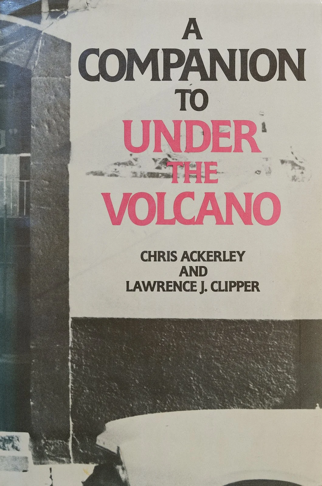 Book cover titled 'A Companion to Under the Volcano' by Chris Ackerley and Lawrence J. Clipper.