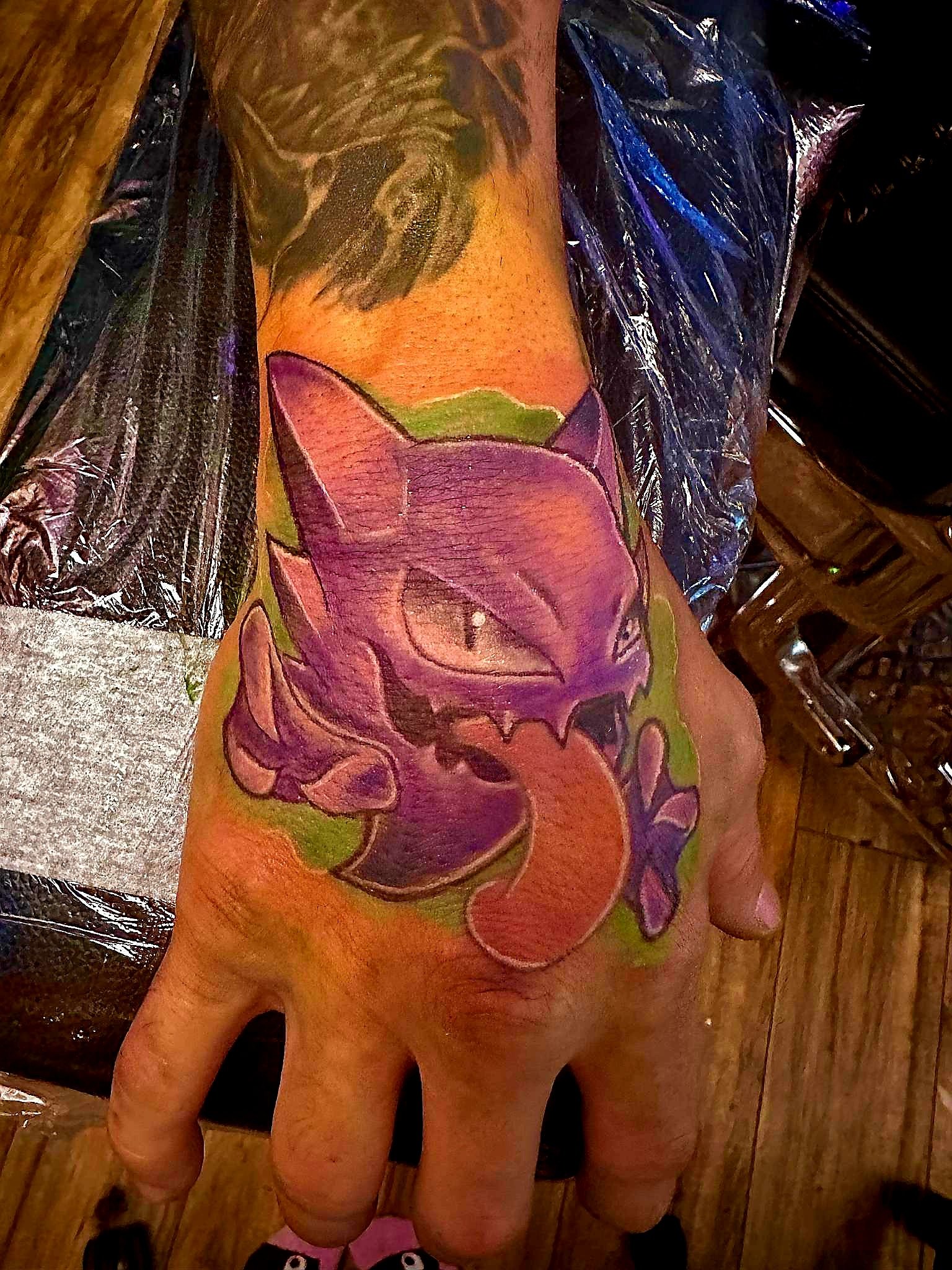 Purple hand tongue.jpeg