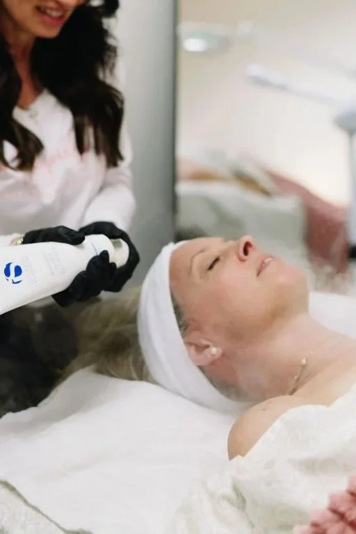 Person receiving a facial by professional esthetician