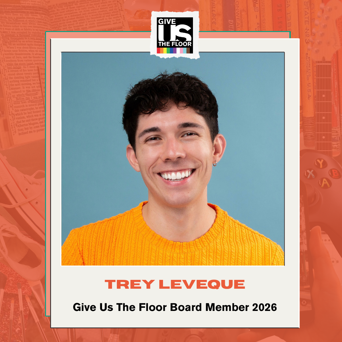 Trey Leveque has short black hair and is smiling in a yellow sweater, in front of a light blue background
