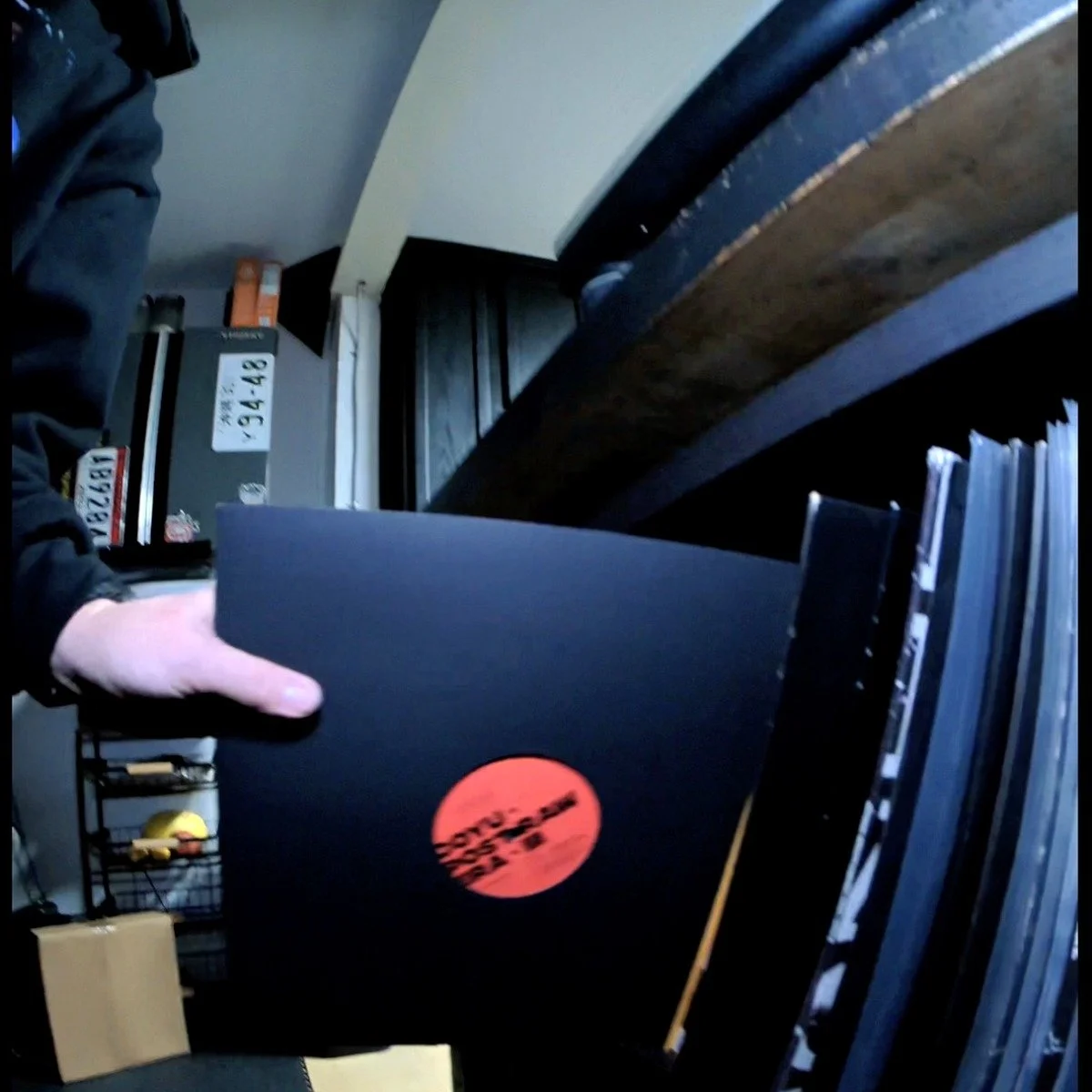 PRTTYUGLY looking through vinyl records
