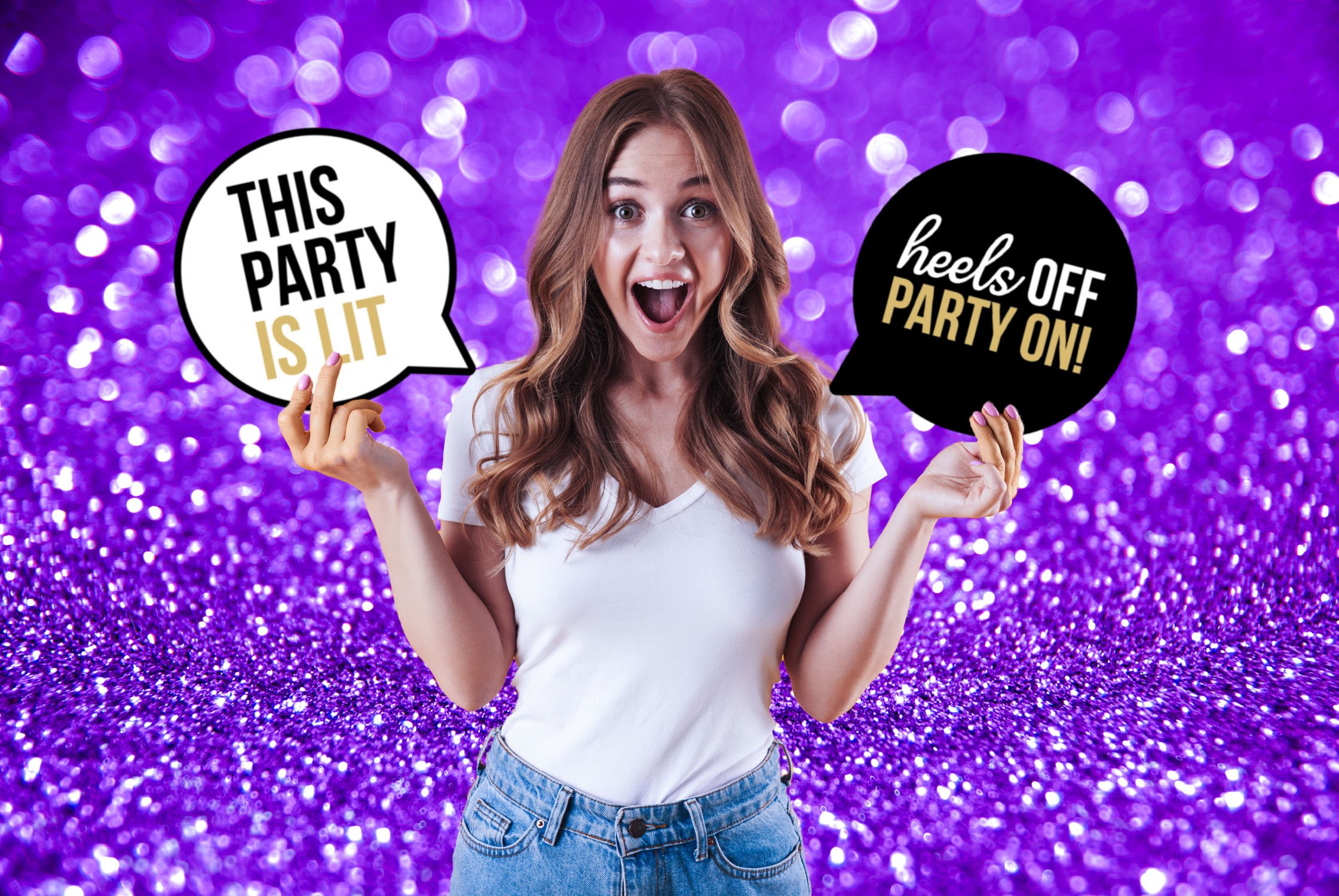 Guest enjoying an Ausome Love Studio photo booth experience in Darwin, posing with fun party slogans against a vibrant purple glitter backdrop.