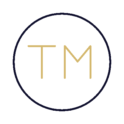 A dark navy blue background with the gold initials 'T' and 'M' in the center.