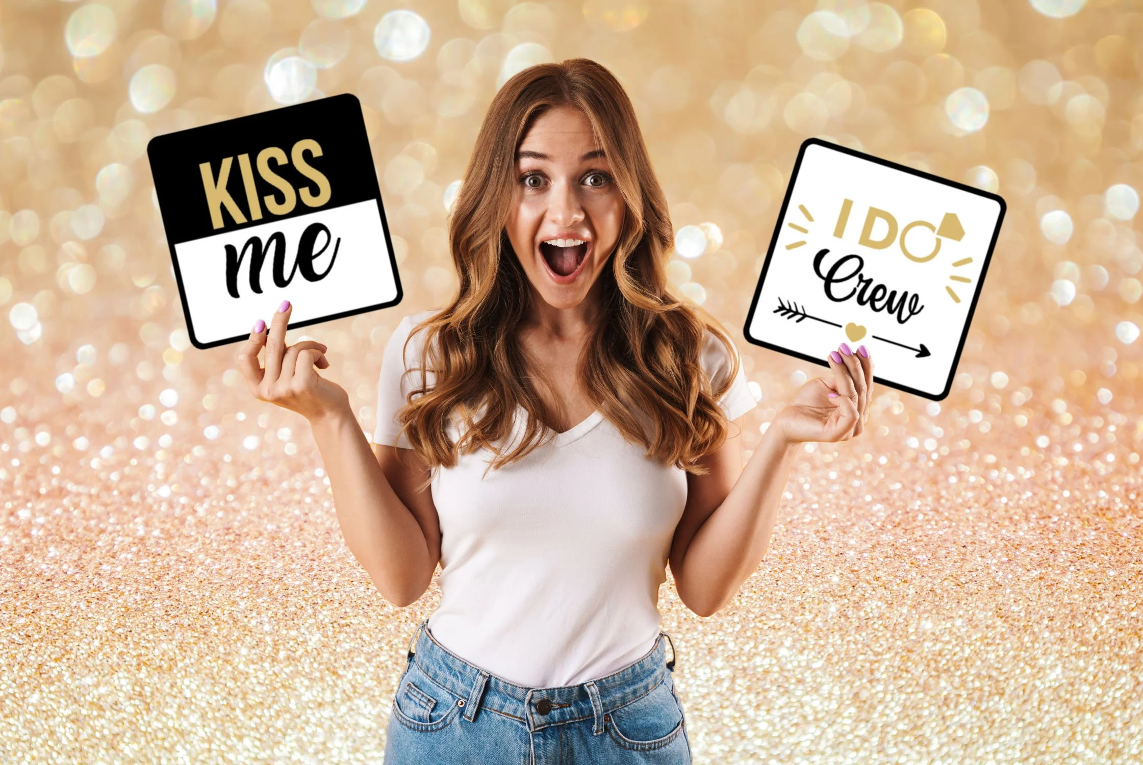 A young woman with long curly hair holding signs that say "Kiss me" and "IDG Crew" with a sparkly gold and white background.