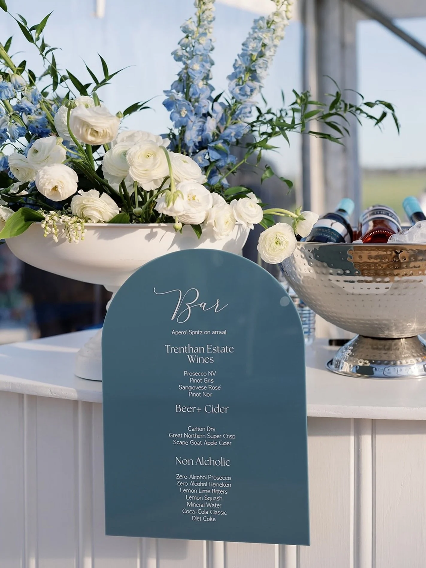 Happy Saturday! 🌞

I get lots of questions about our custom upgrades to our welcome signs and bar signs. Here is a perfect example! This couple wanted to incorporate blue signage into their day to compliment their overall theme &amp; vibe so we went