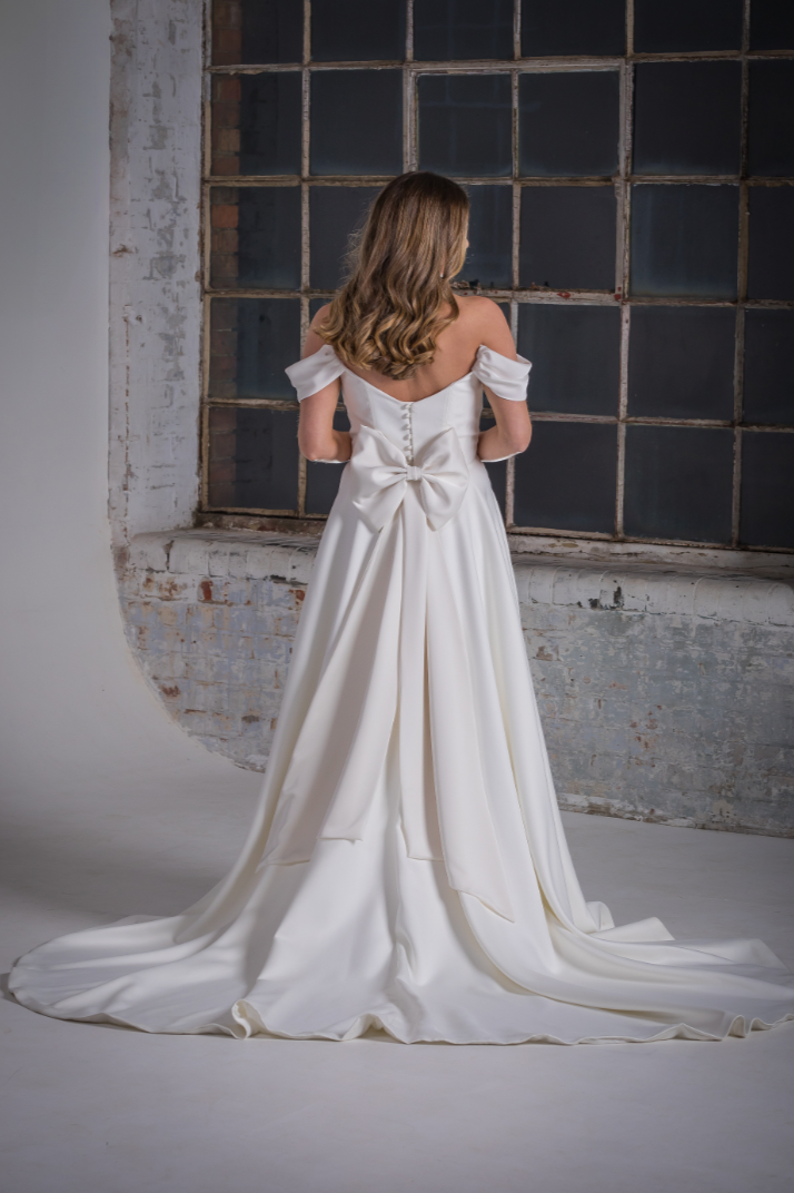 Cayla+Satin+Wedding+Dress+with+detachable+bow+and+straps+back+2+Orchid+Collection+Natalya+James+2025-335.png