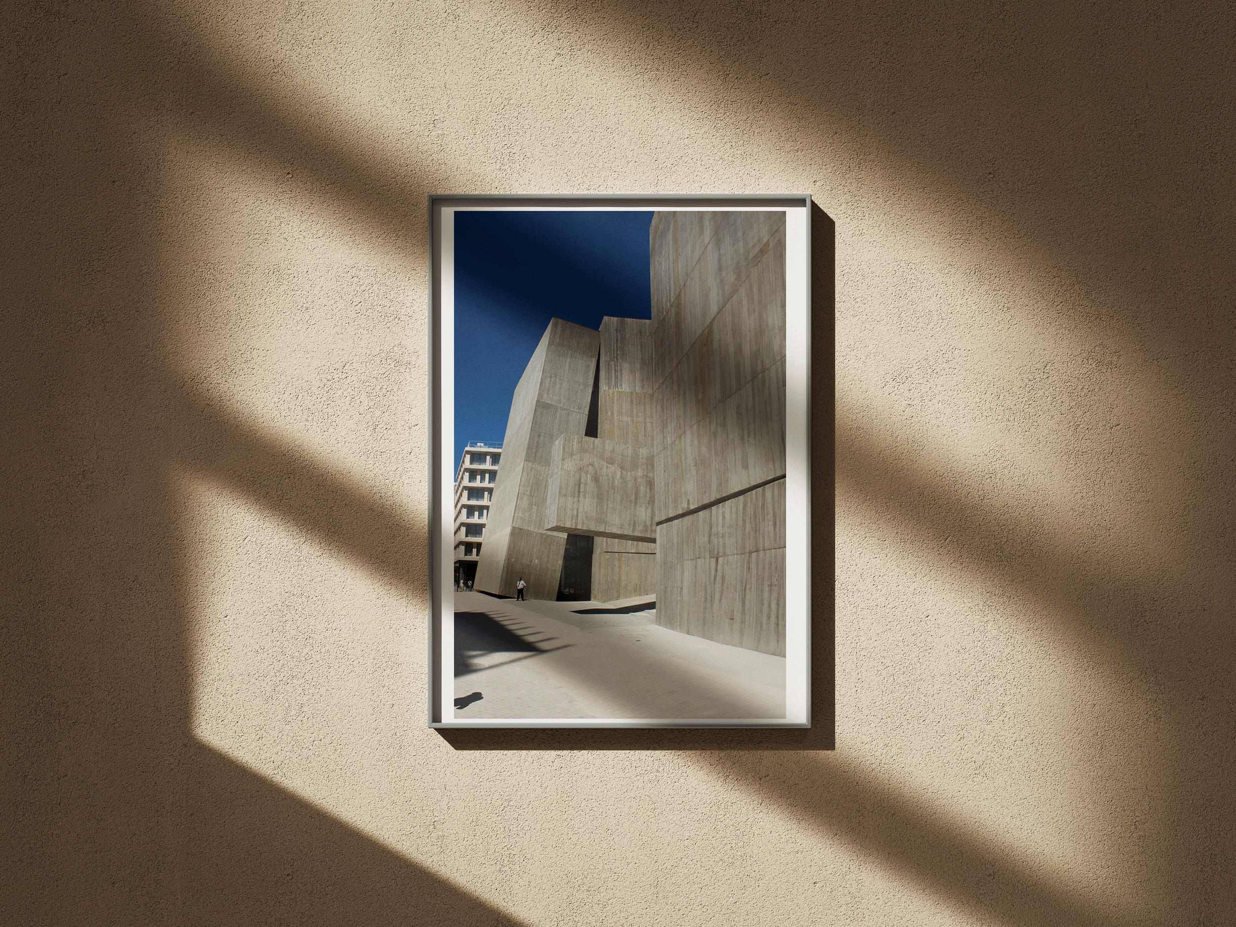 Poster_Frame_on_the_Wall_Mockup_Brutalistlisboa.png