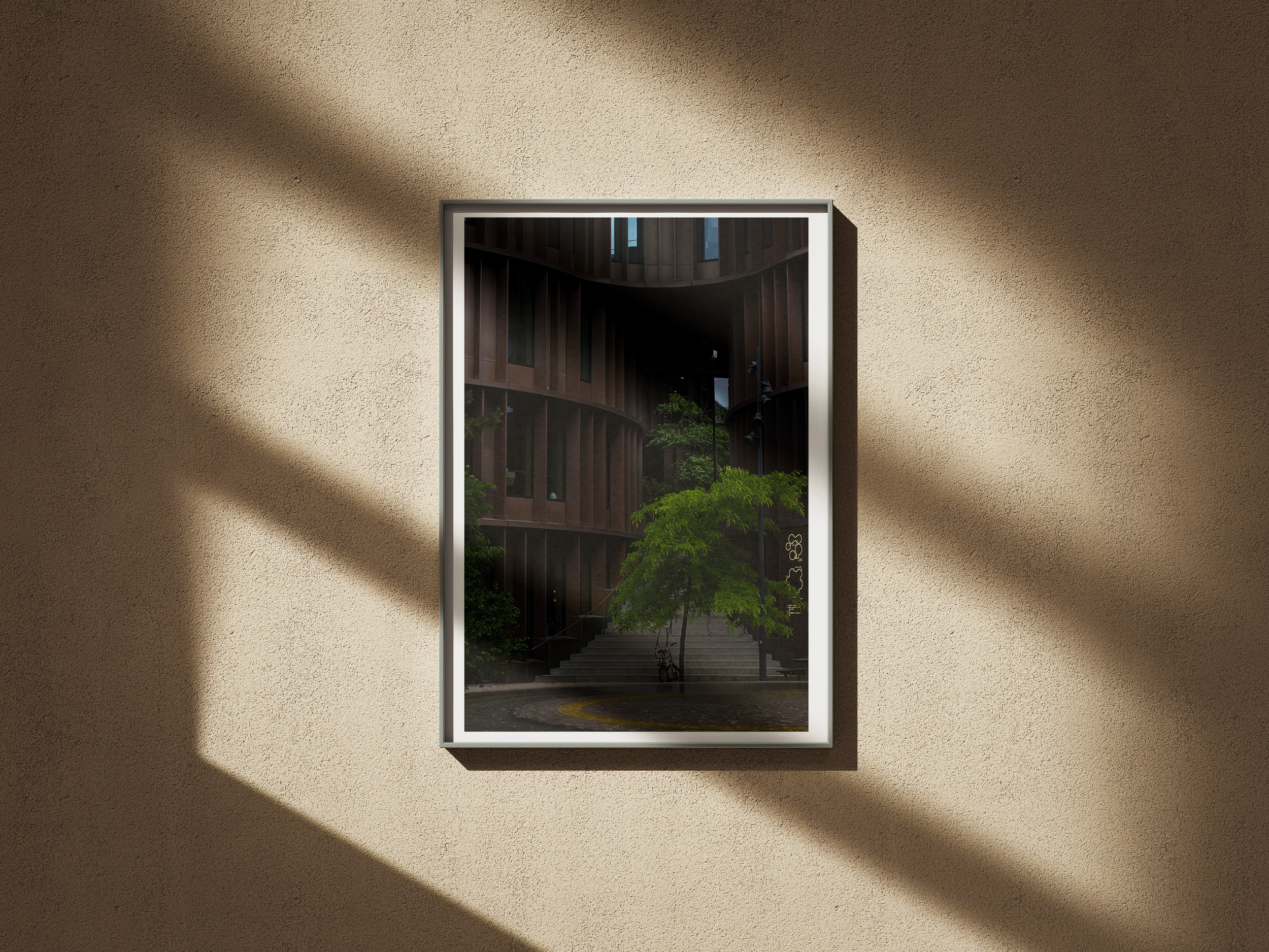 Poster_Frame_on_the_Wall_Mockup_Axel TOwers entrance.png