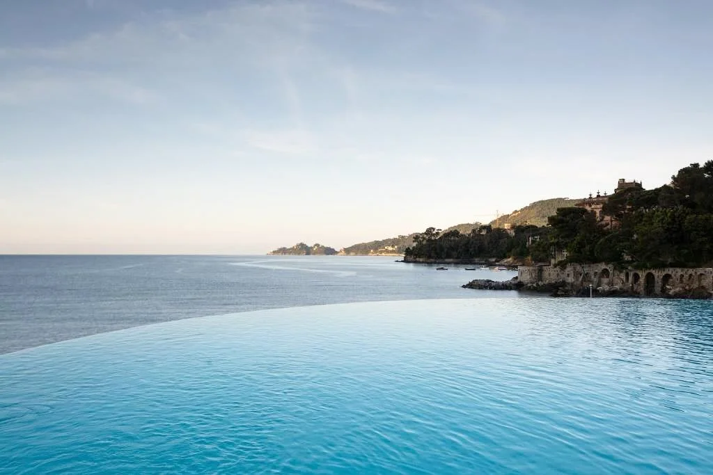 Dreaming of blue skies! Counting down the days until next year. Can&rsquo;t wait to soak up the sun by the infinity pool at our Italian hotel. What a view!