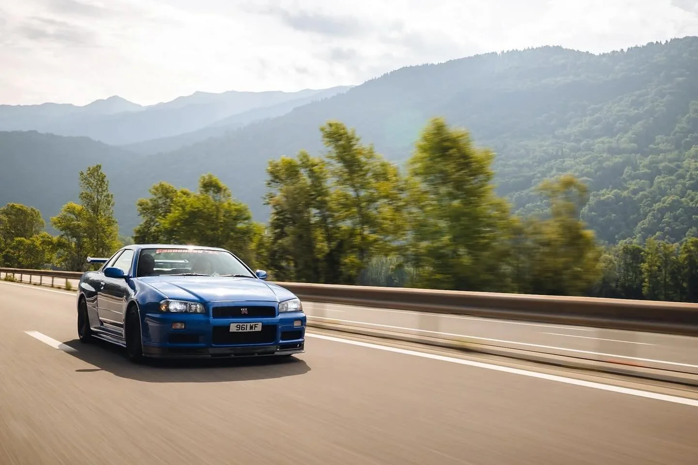 Great rolling shot of William and Heather&rsquo;s R34 Skyline GTR from this year&rsquo;s EuroRun. 

📷 @bh1photography 

#nissanskyline #nissanskylinegtr #skylinegtr #r34skyline