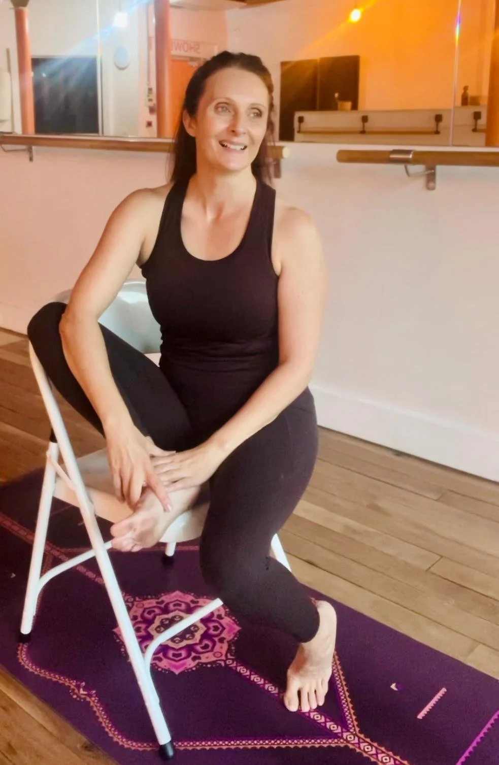 Helen at Yantra Studio teaching a chair yoga and movement class at yantra studio norwich