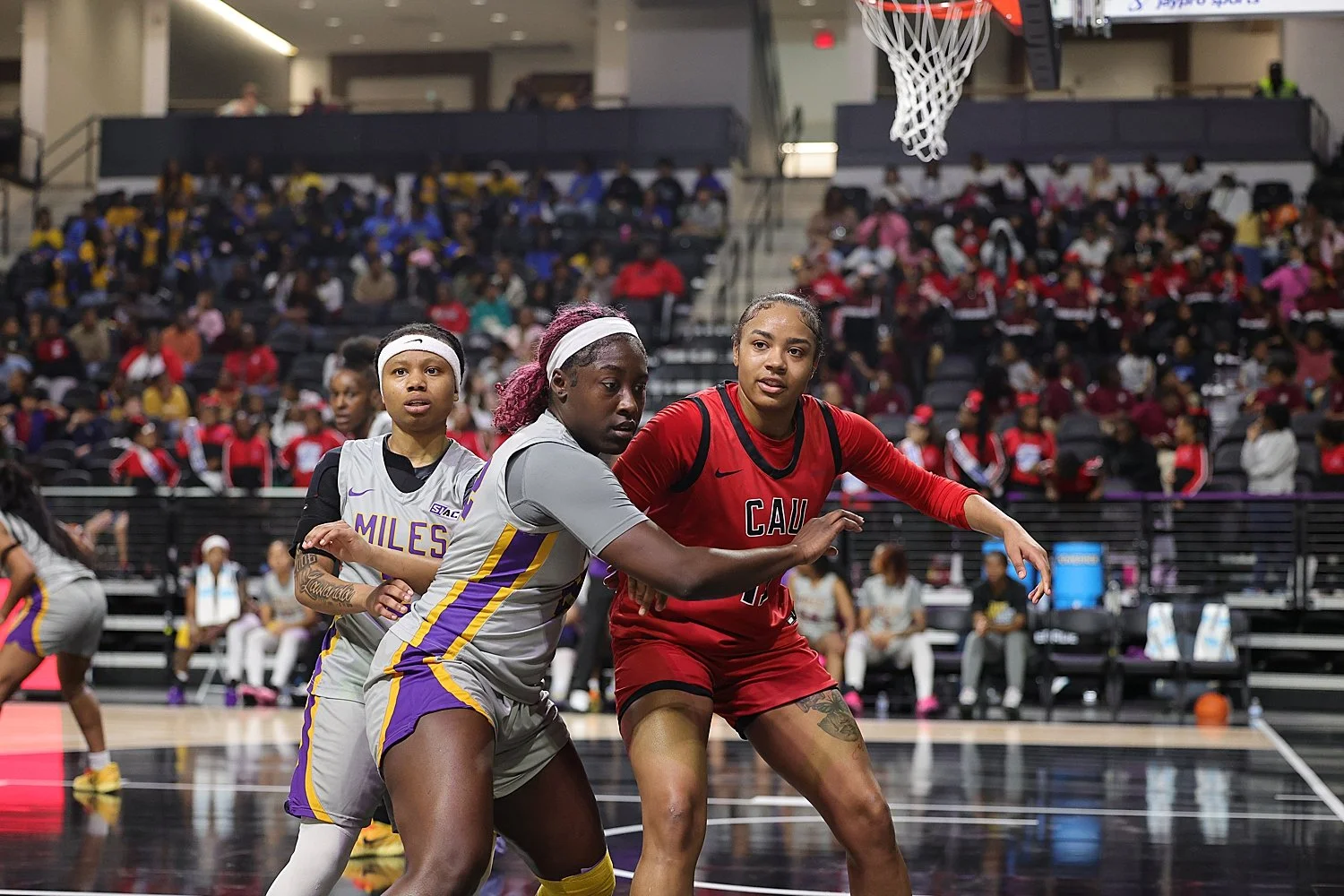 women playing basketball in college on court showing how to Build Your Athlete’s Confidence