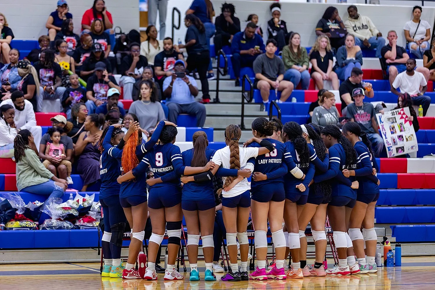 high school volleyball team gets ready for final game by Atlanta sports photography