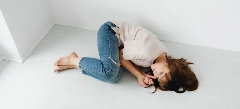a woman lying on the floor