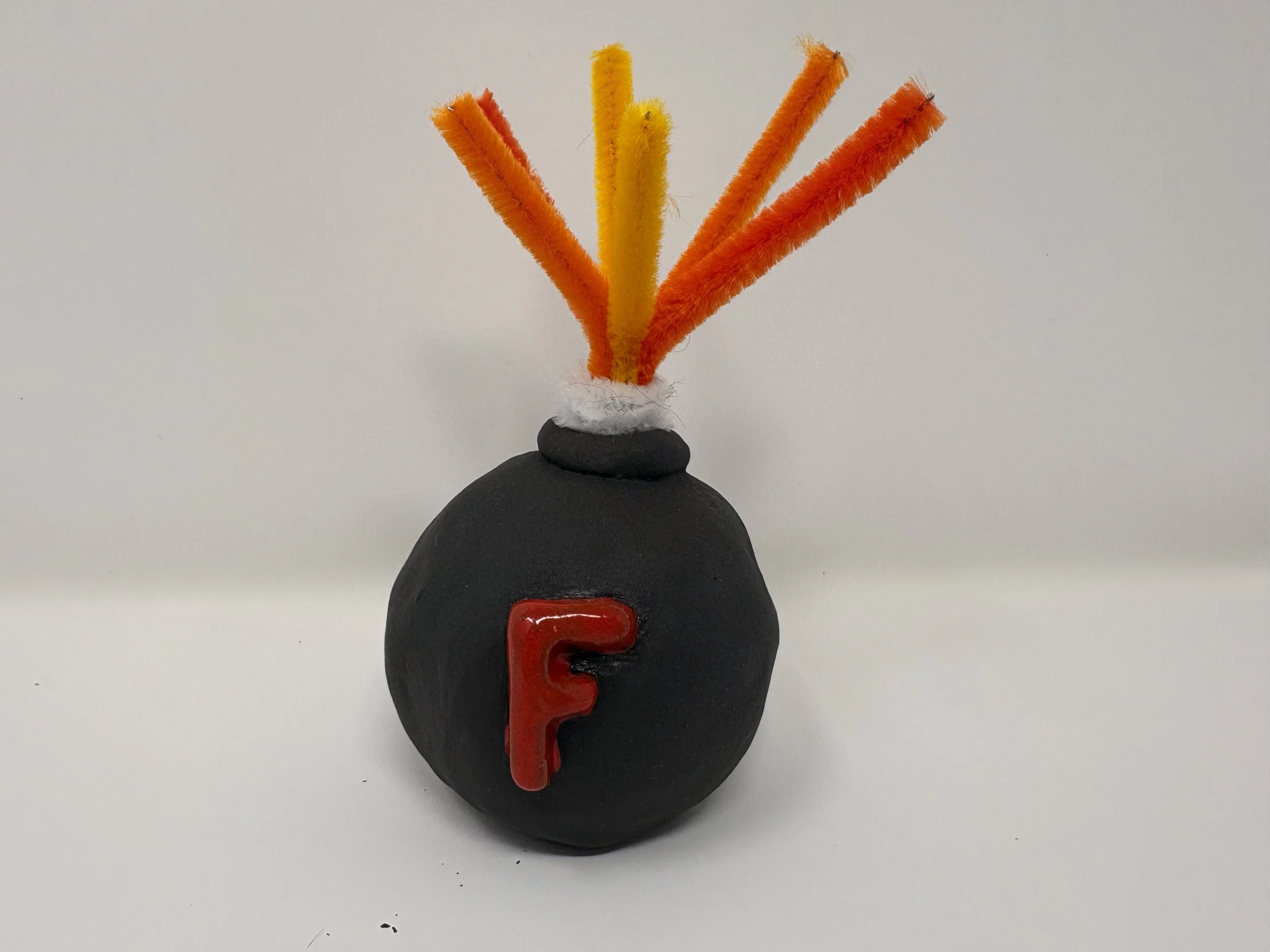 F Bomb

Alt description: A black sphere with a shiny, red “F” on the front. yellow, orange, and red pipe cleaners spark out of the top of the sphere. 

As I run out of energy and I can’t get out of bed or off the couch to do things I enjoy; as my bal