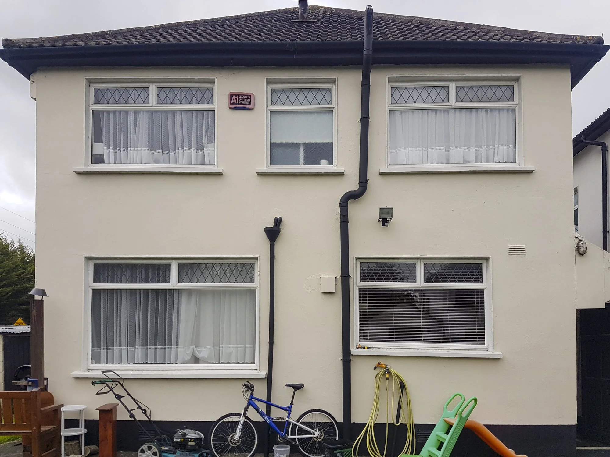 Rear of home before home energy upgrade.