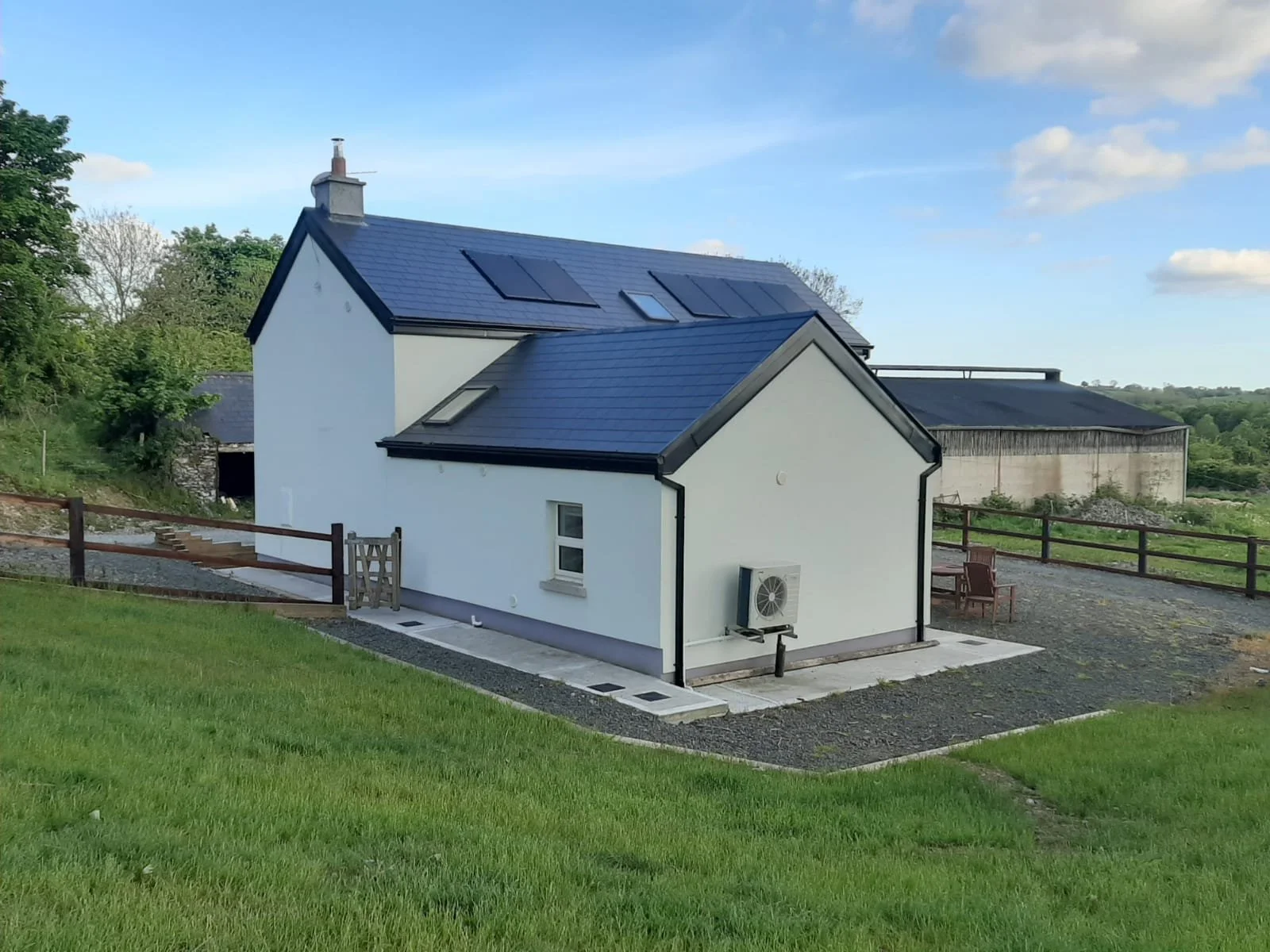 Rear of the home after extensive renovations and energy upgrades.