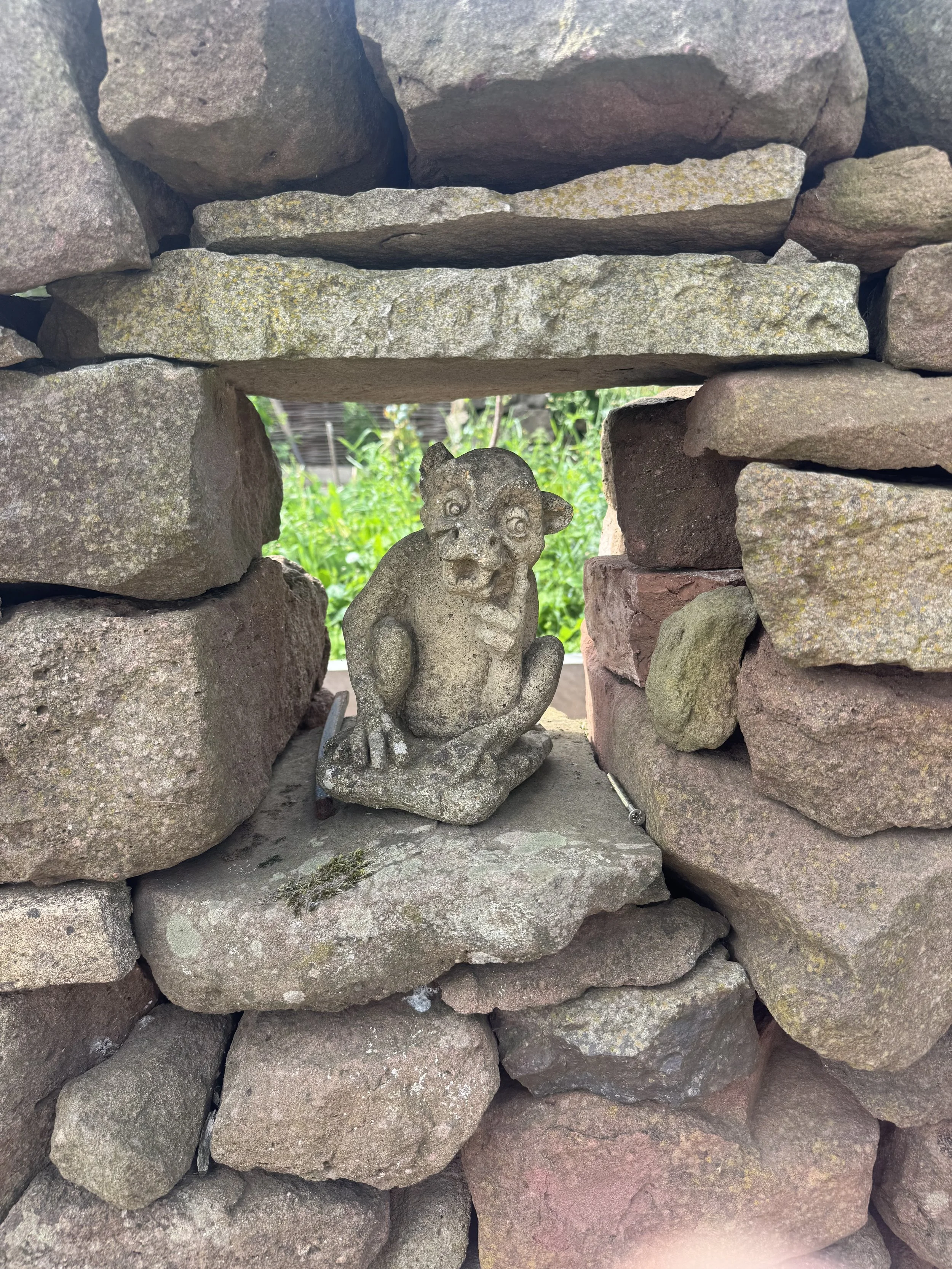 A gargoyle in the wall