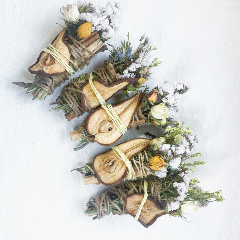 Pear, Palo Santo, Juniper, and Cinnamon Smudge Stick.png