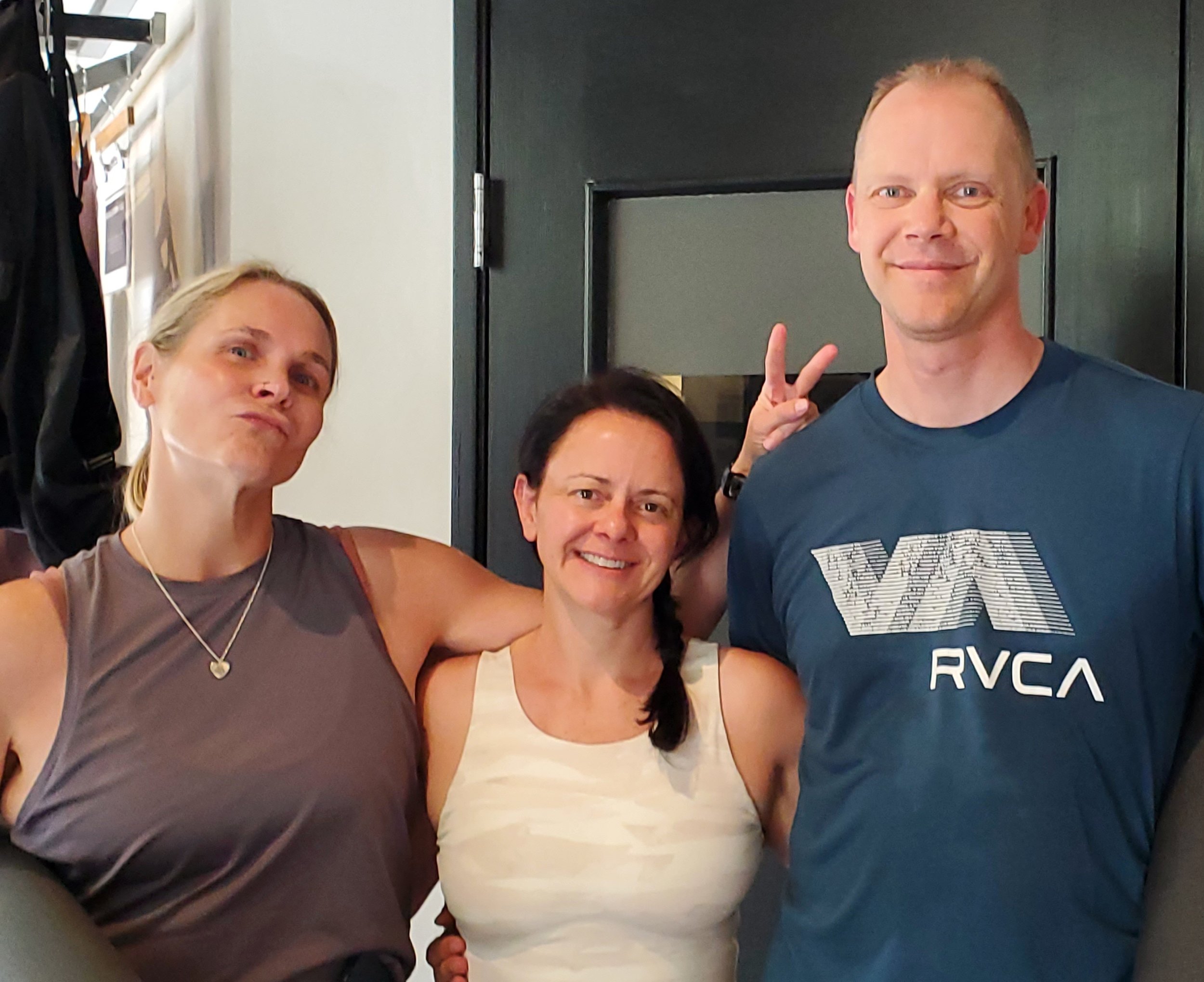 Heather Redabaugh with her yoga teach and husband at CorePower Yoga studio in Westminster, Colorado.