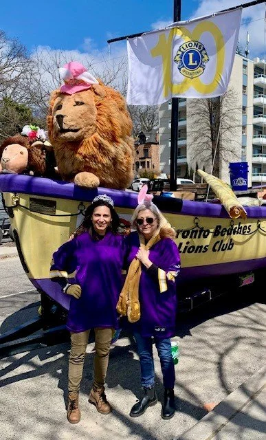 Gearing up to the ride the Beaches Lion's Club Float in the Easter Parade.