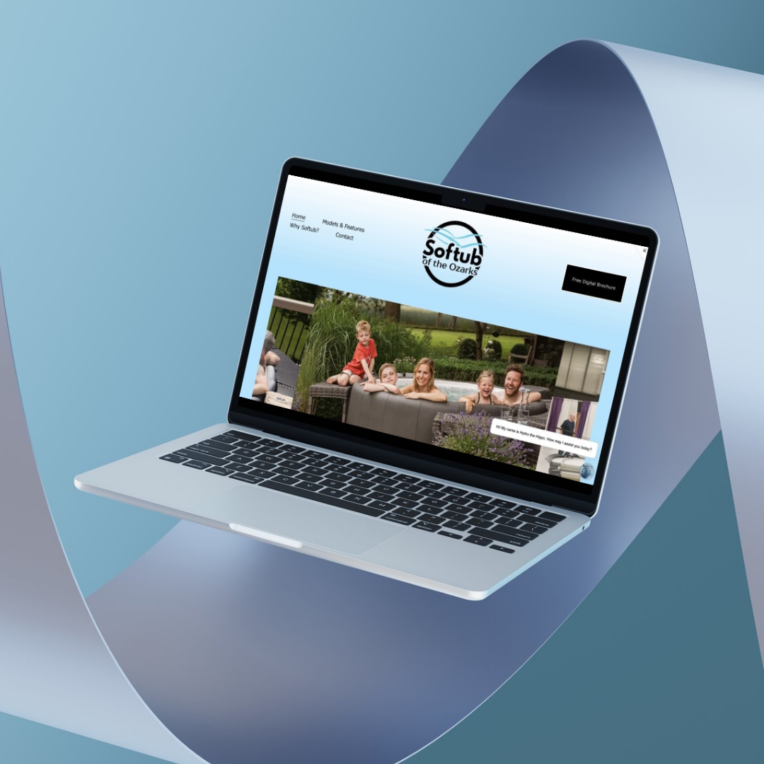 Laptop displaying the website of Softub of the Ozarks, featuring an outdoor scene with a family on a hot tub and a park in the background.